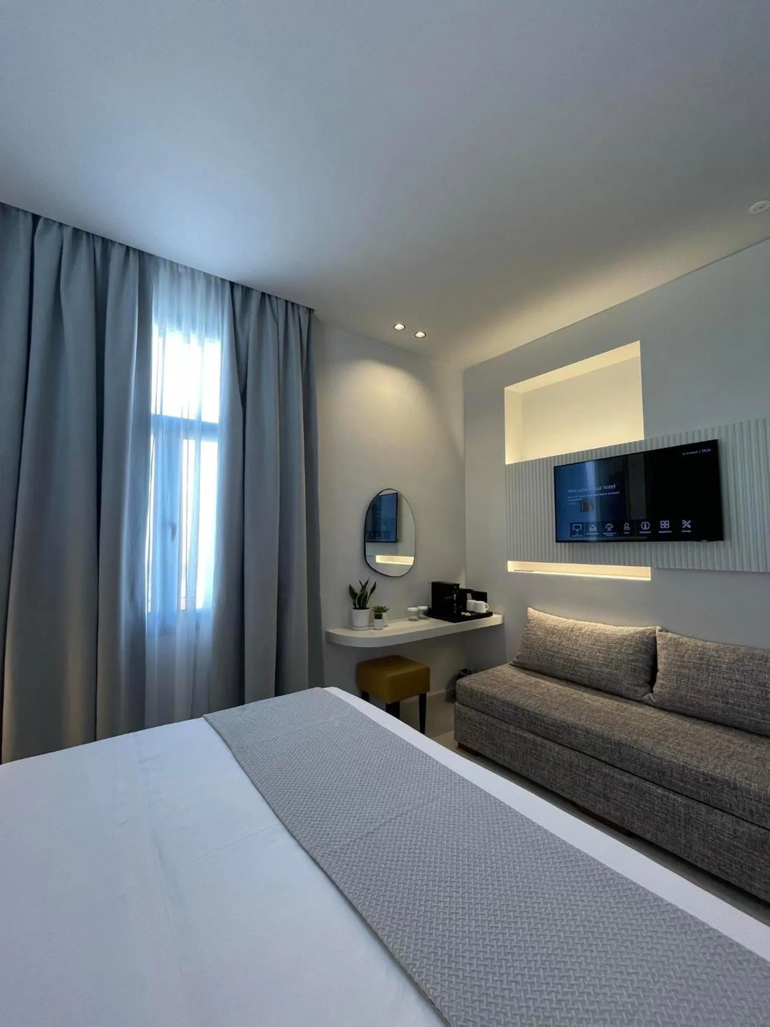 TV and multimedia, Bed in Palladion Boutique Hotel