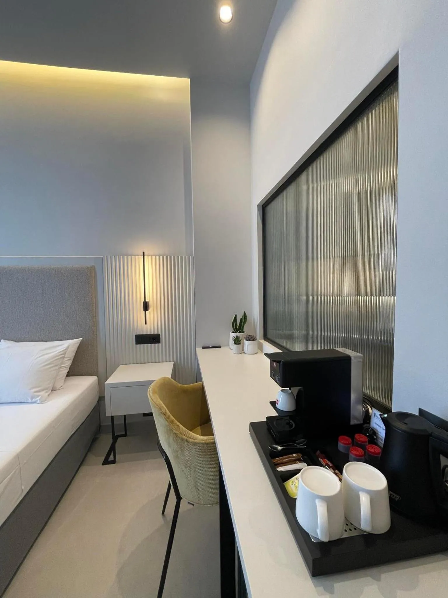 Seating area, Bed in Palladion Boutique Hotel