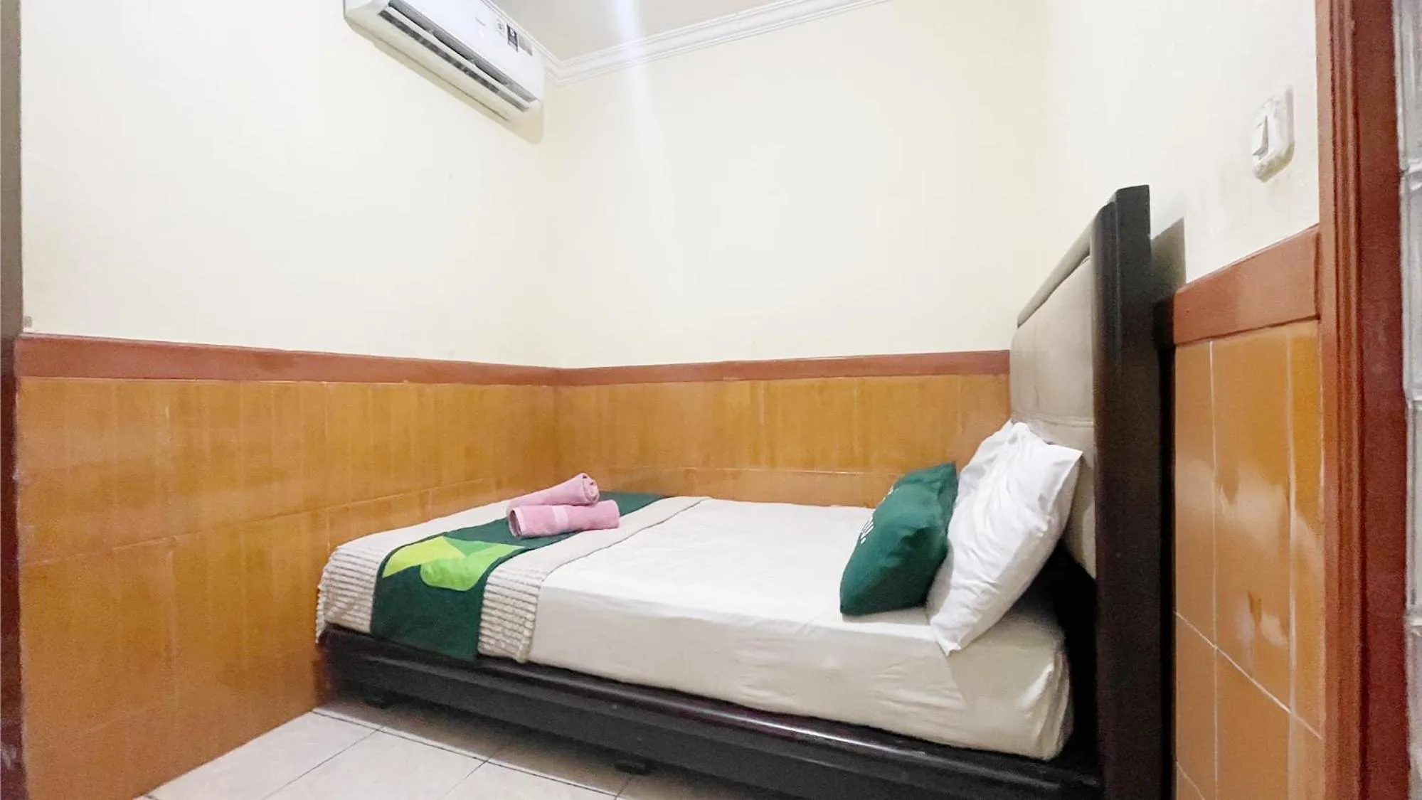 Bed in Bang Day Residence by Ruumu