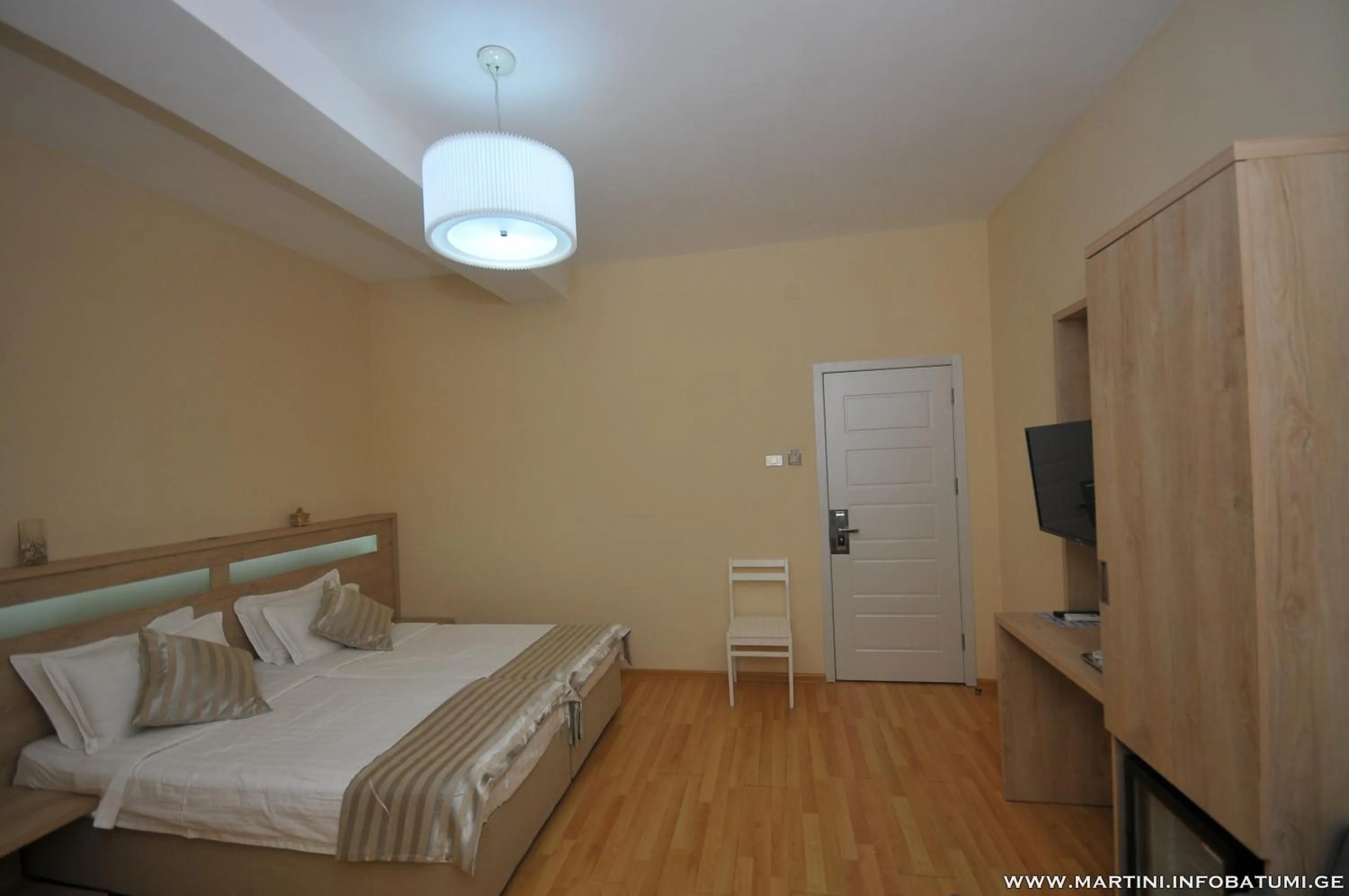 Bed in Hotel Martini Kvariati