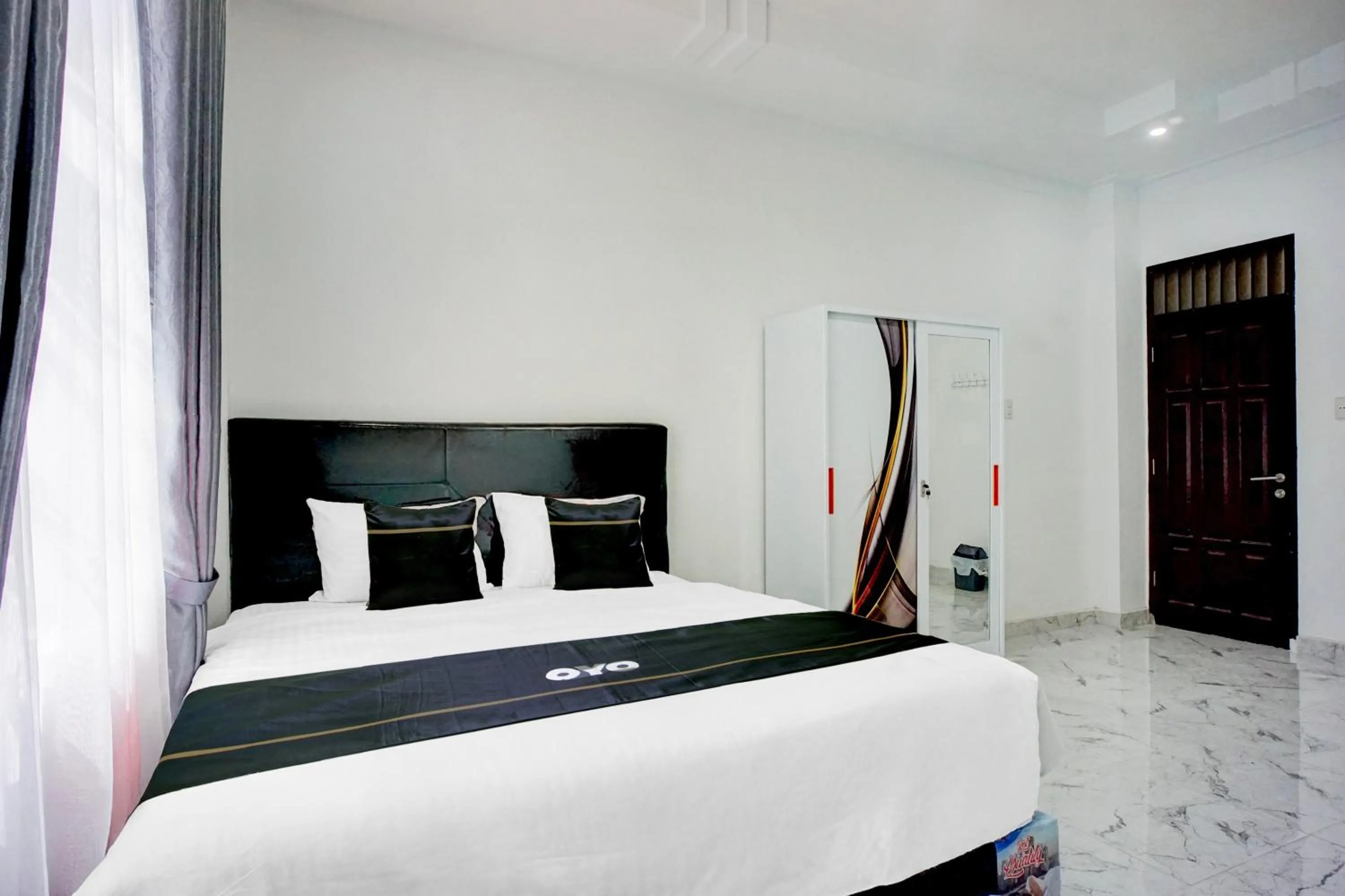 Bedroom, Bed in Hotel O Sm Raja Guest House