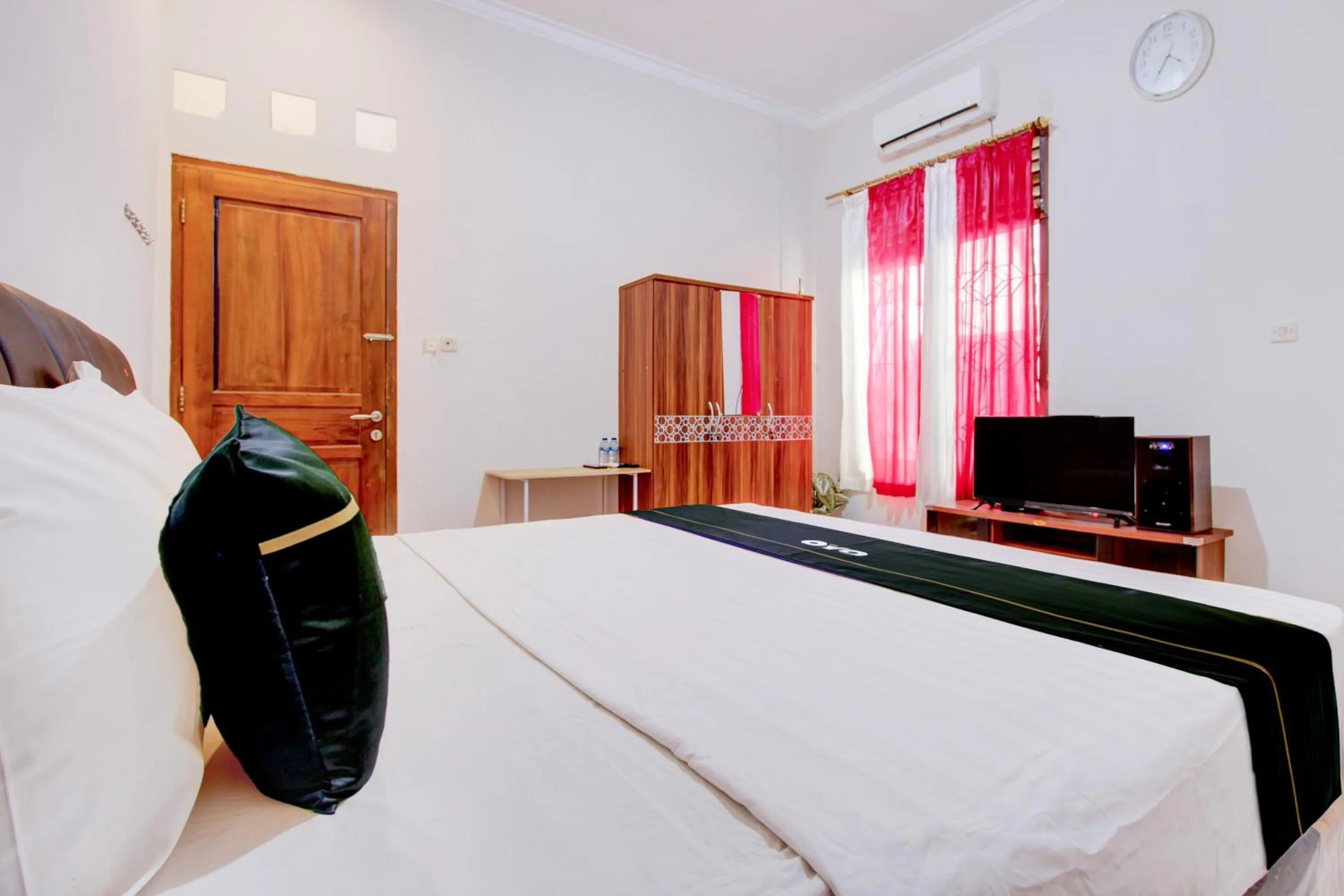 Bed in SPOT ON Podomoro Homestay