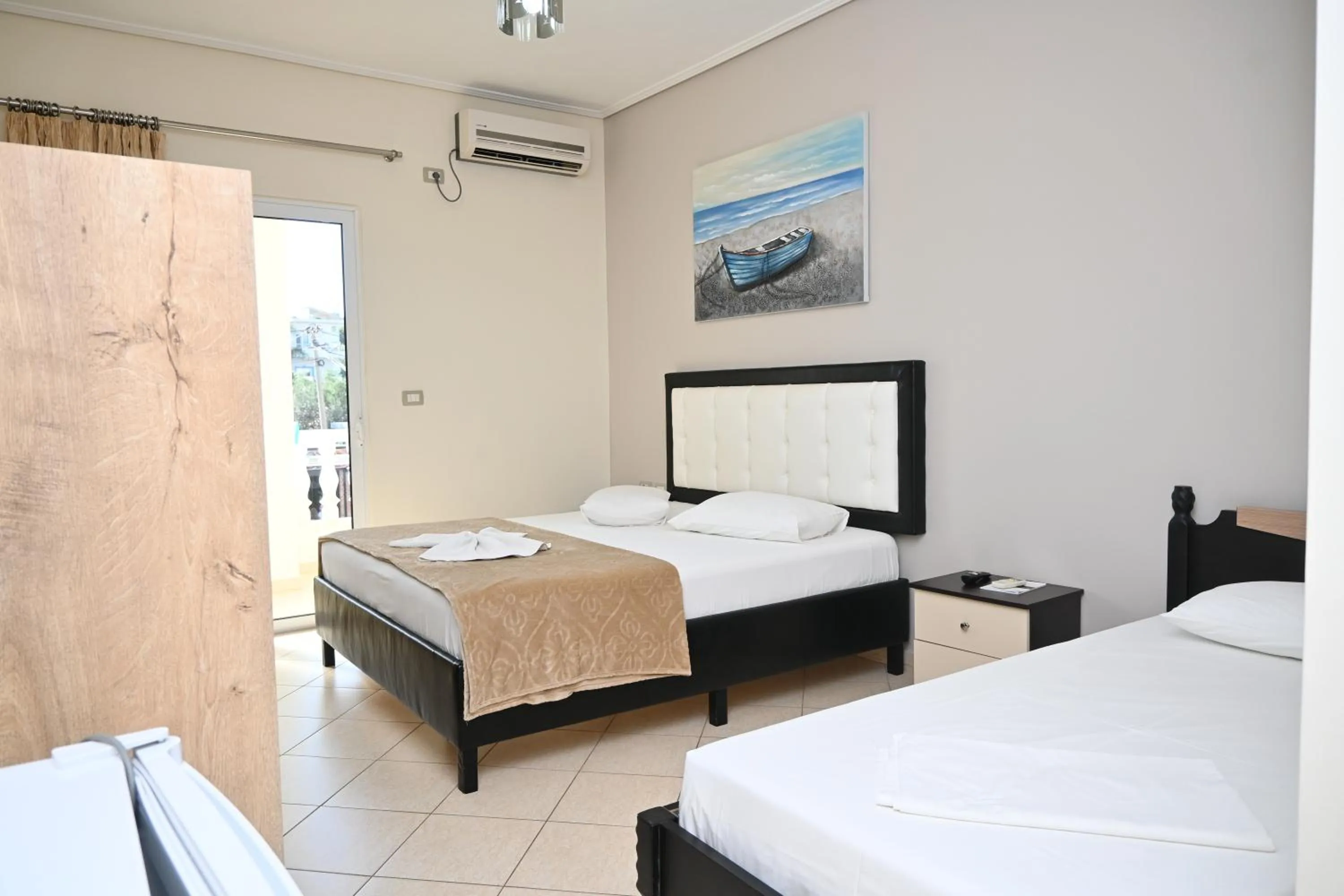 Bed in EROS HOTEL Ksamil