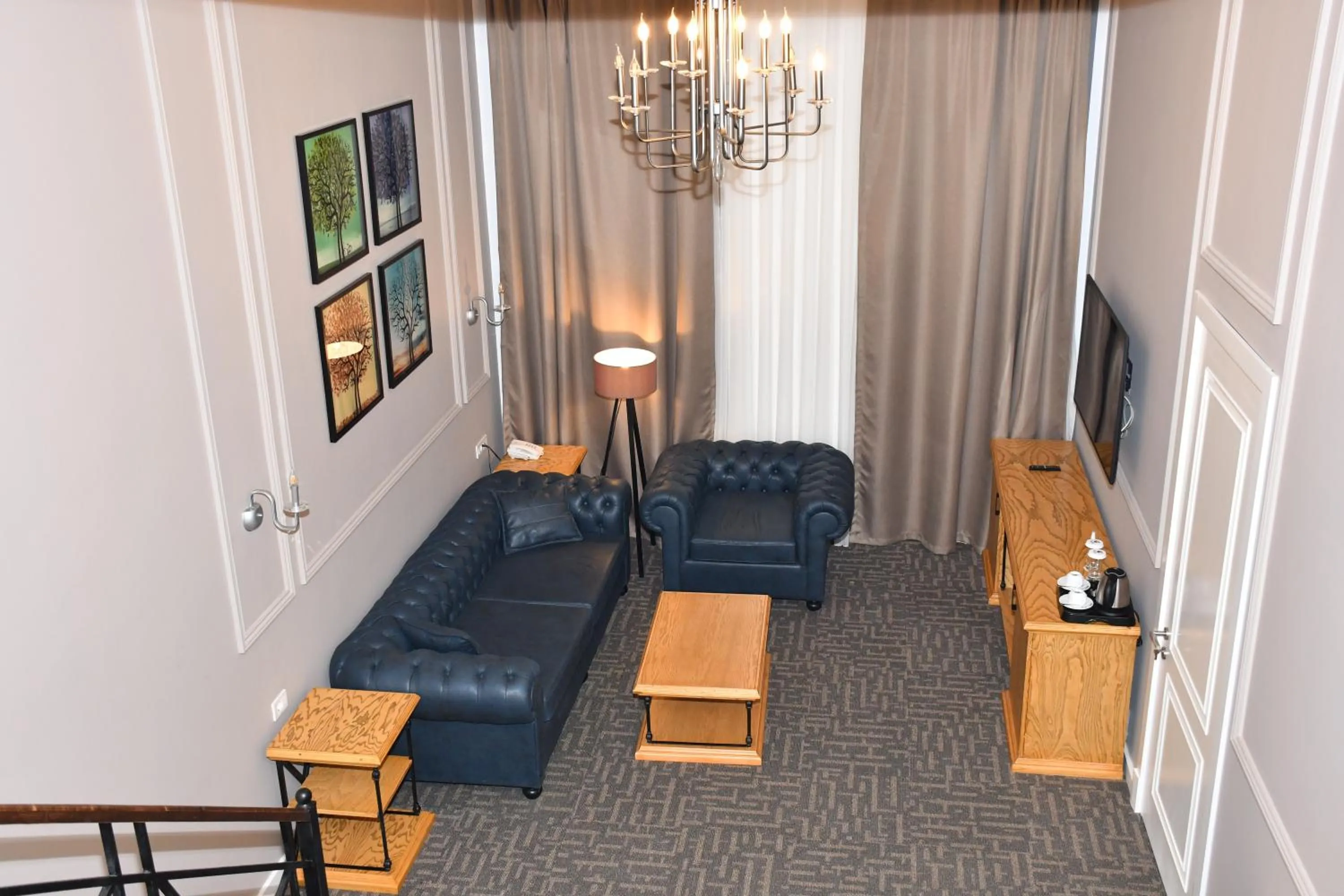 Communal lounge/ TV room in Callisto Baku