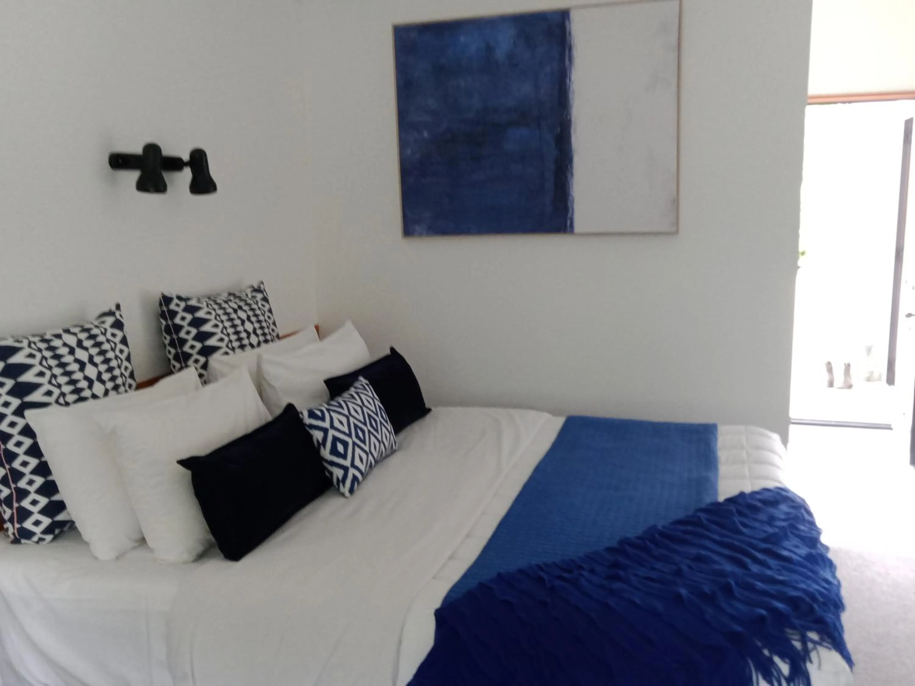 Bed in Four Peaks Motel