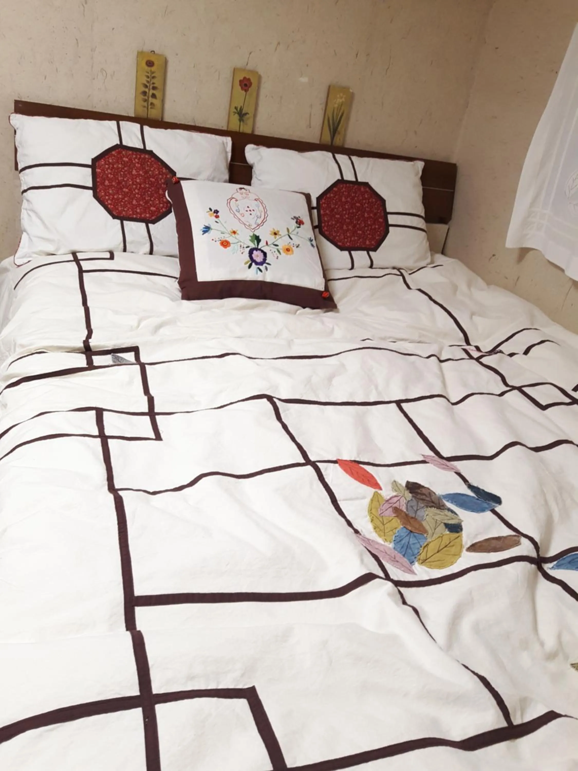 Bed in Lydia Craft Guesthouse