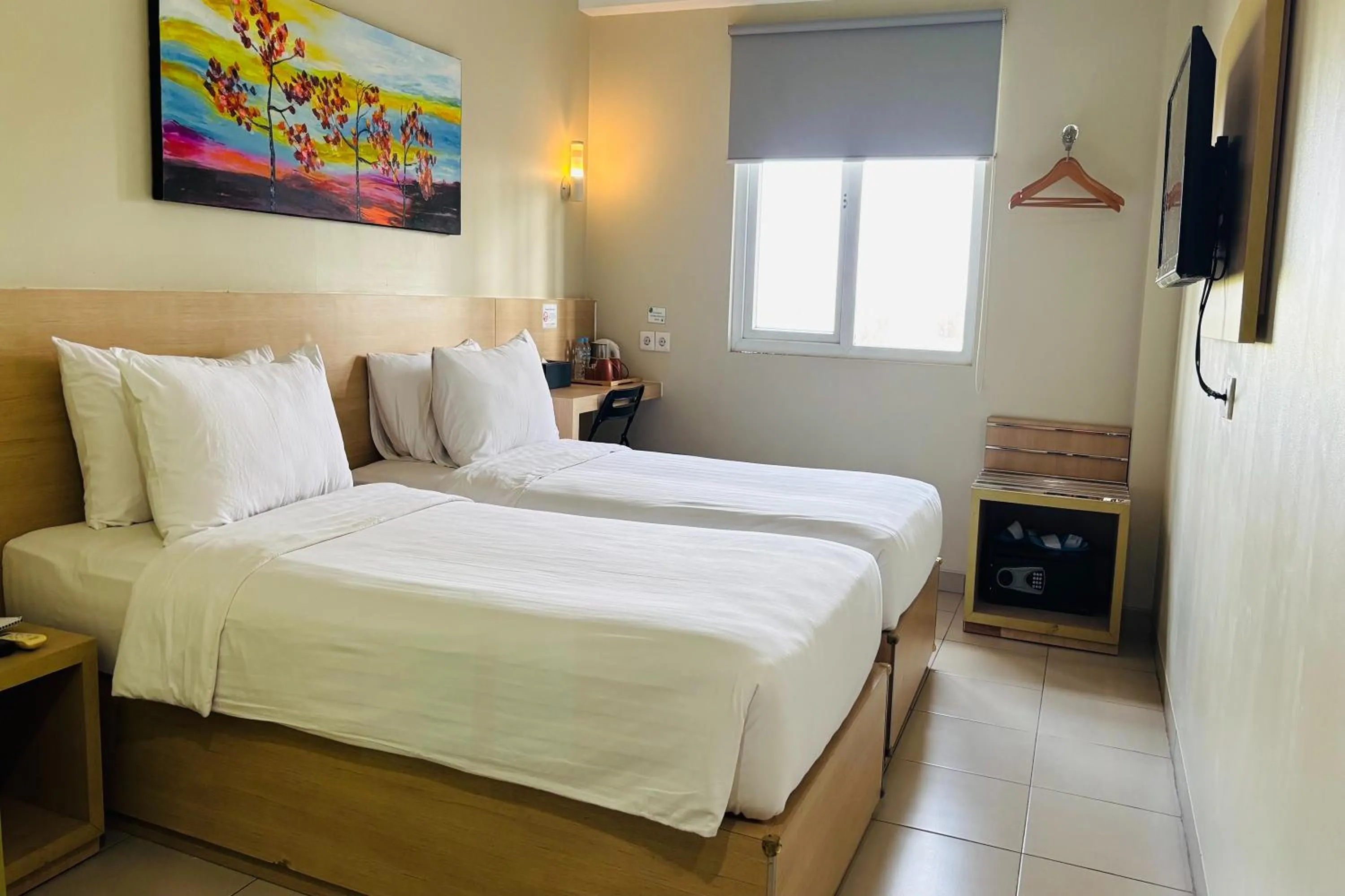 Bed in Lemo Hotel Serpong