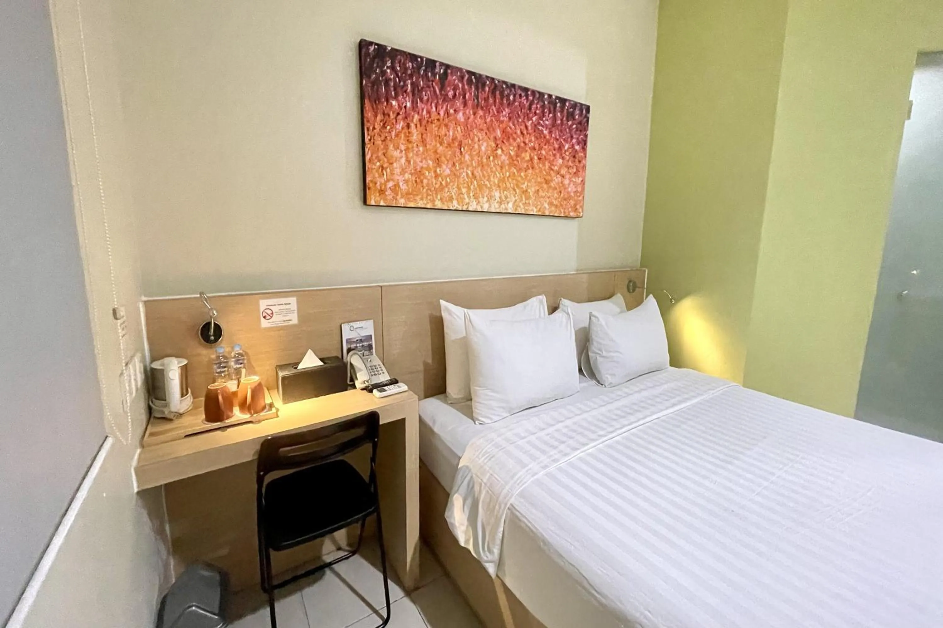 Bed in Lemo Hotel Serpong