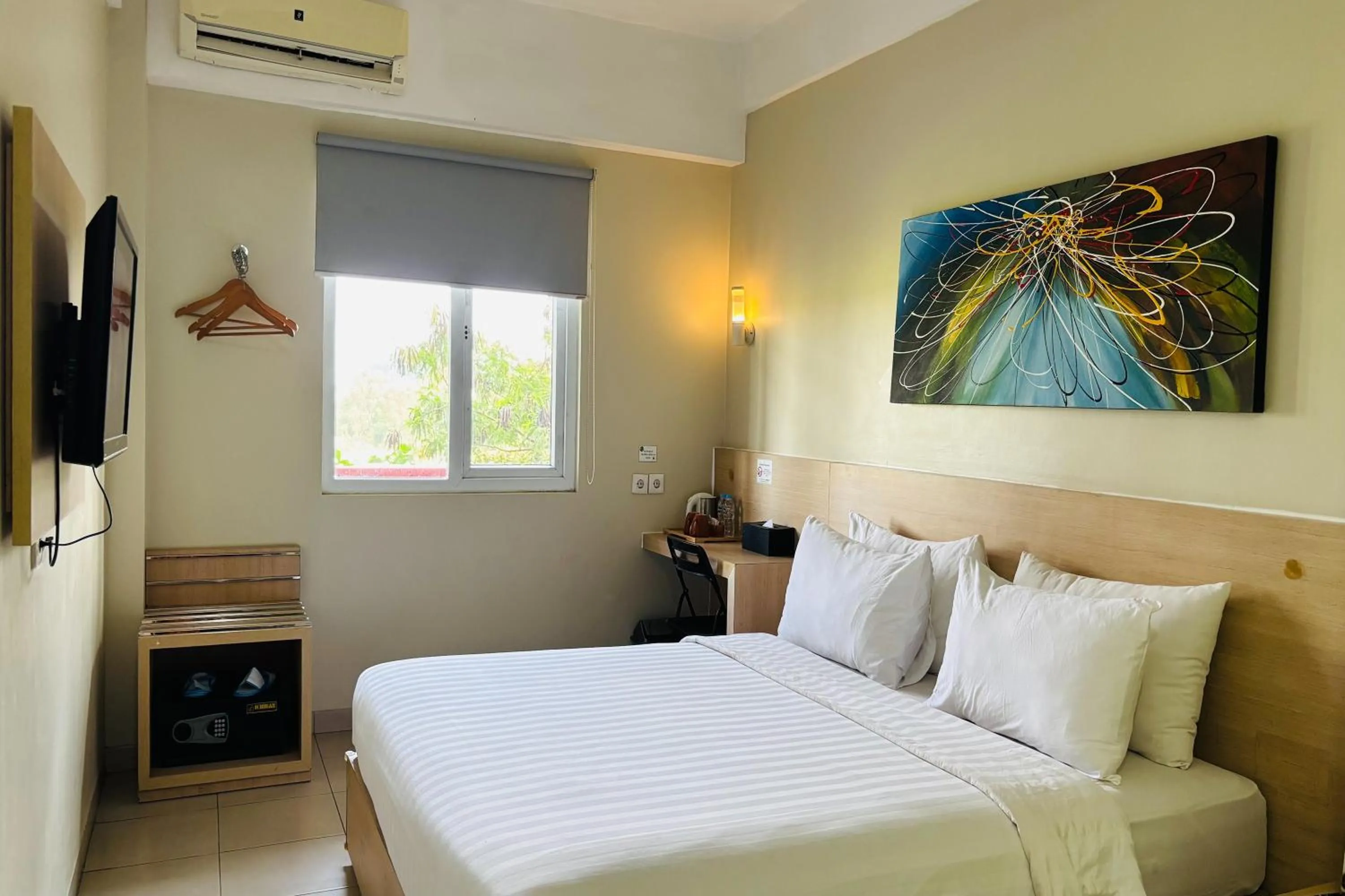 Bed in Lemo Hotel Serpong