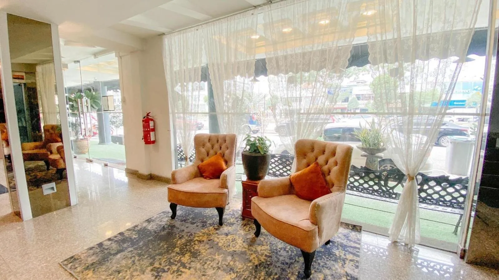 Lobby or reception in Queenspark Lovita Hotel