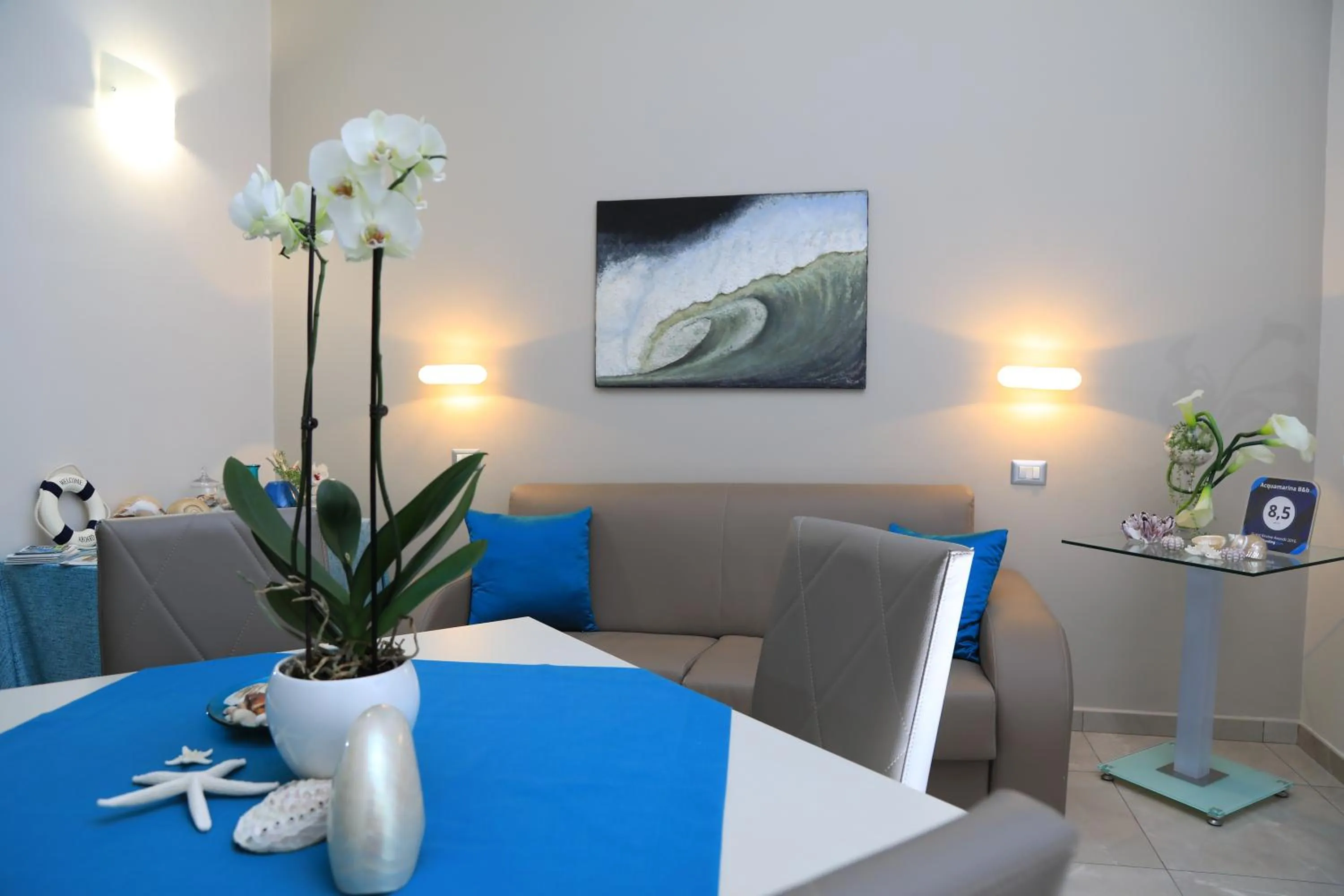 Communal lounge/ TV room in Acquamarina B&b