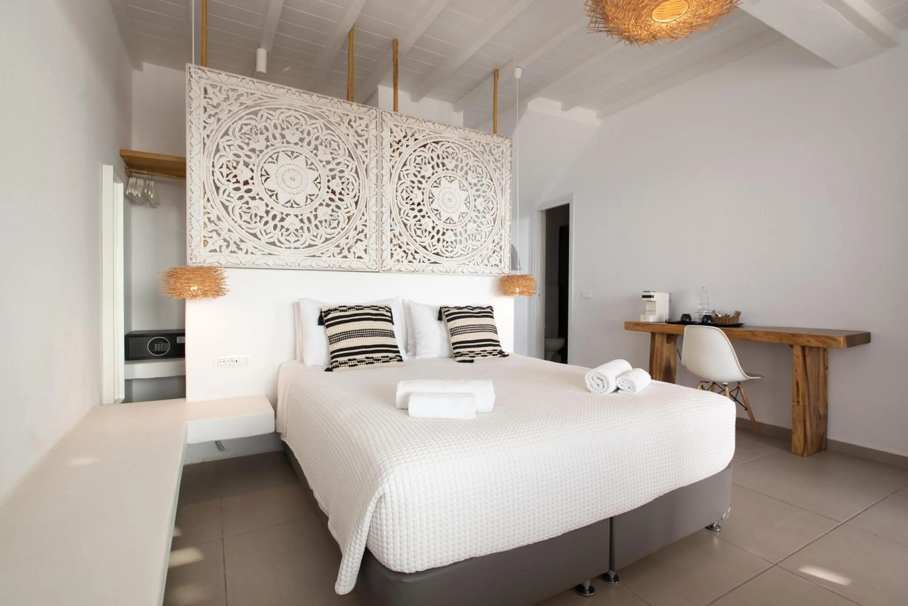 Bed in Bellou Suites