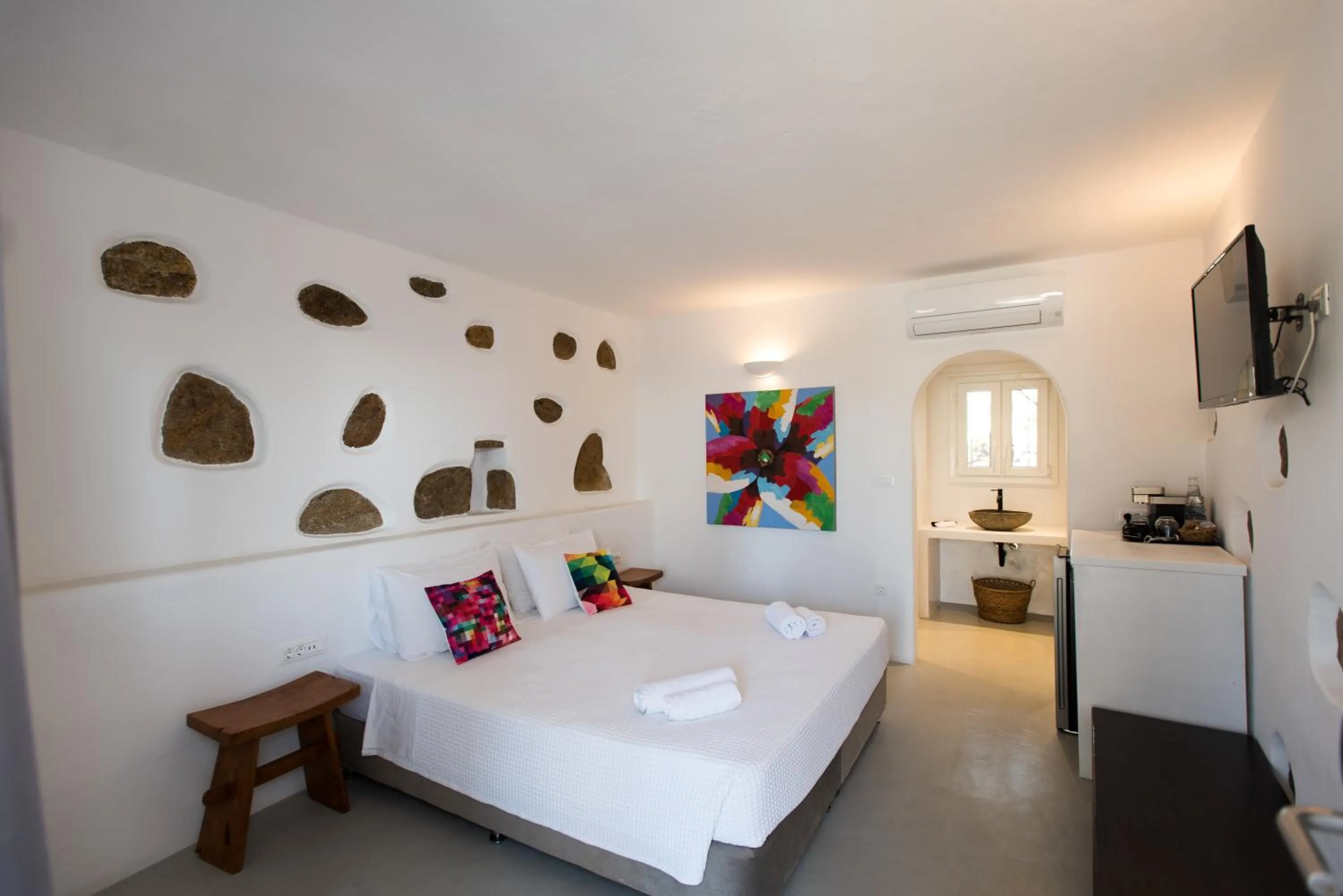 Bed in Bellou Suites