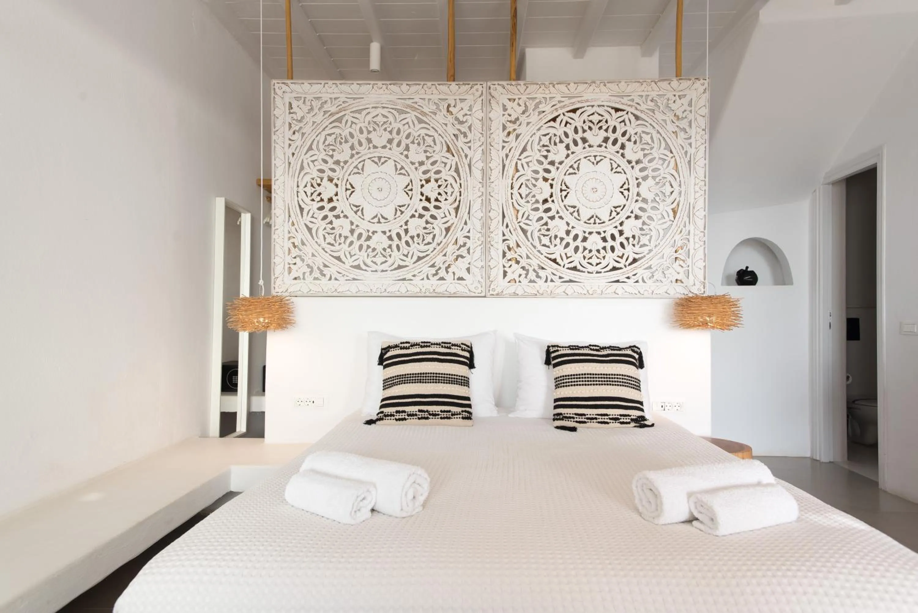 Bed in Bellou Suites