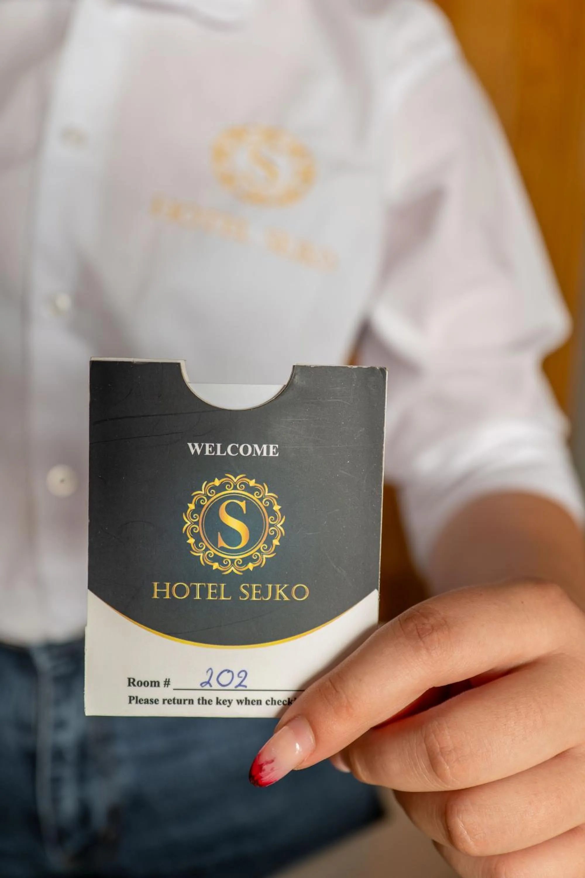 Property logo or sign in Hotel Sejko