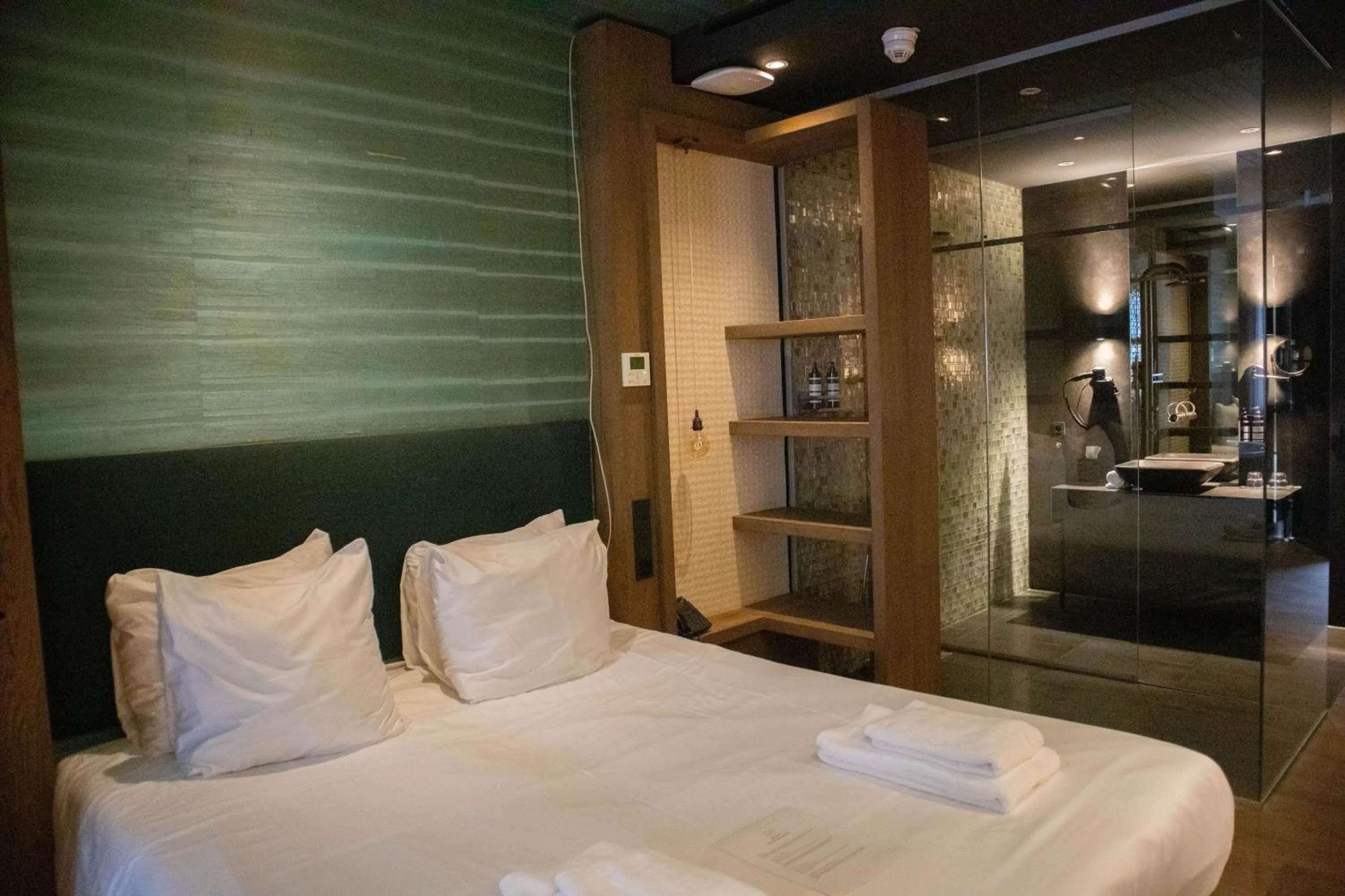 Bed in Manzo's Suites