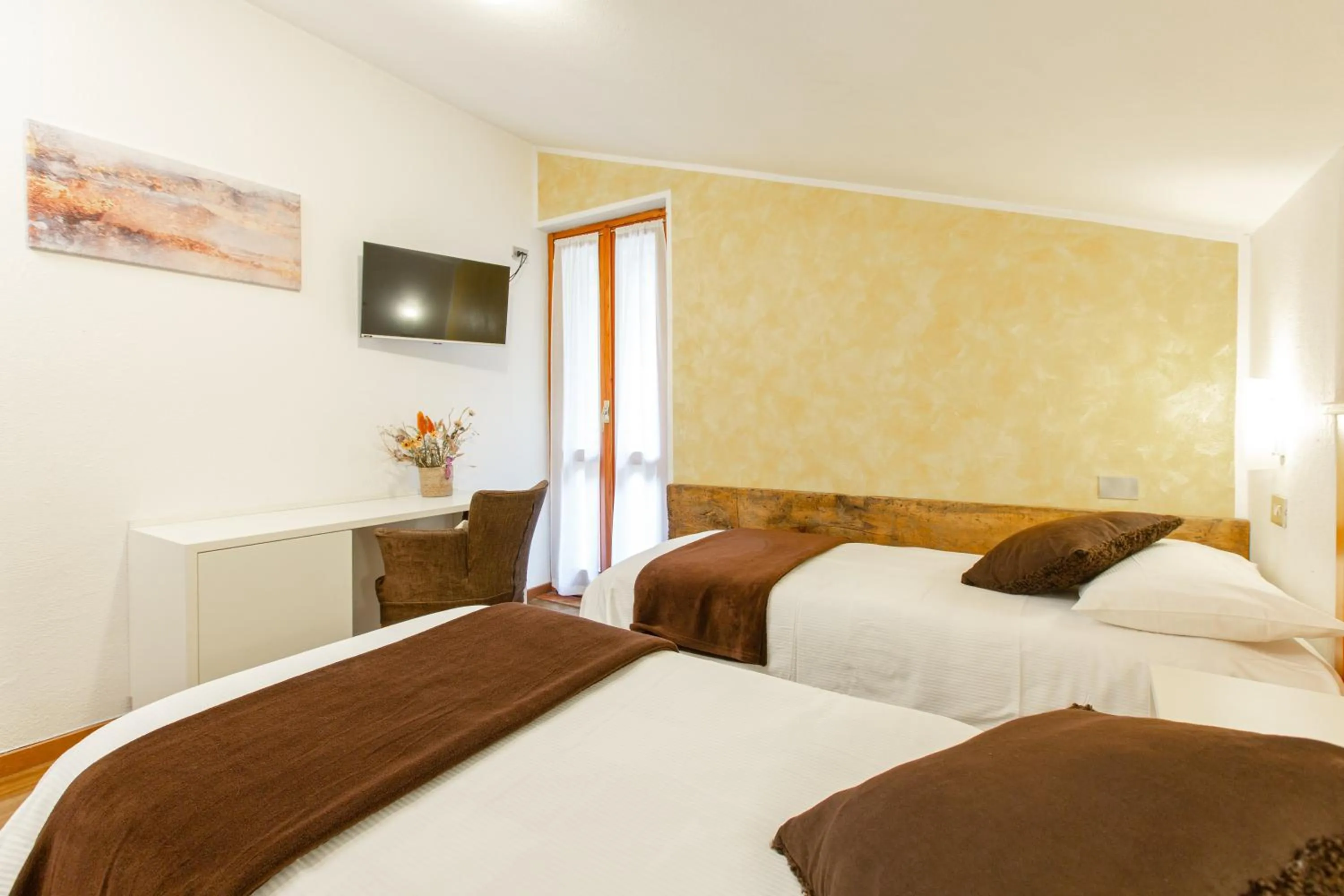 Bed in Hotel Biancospino