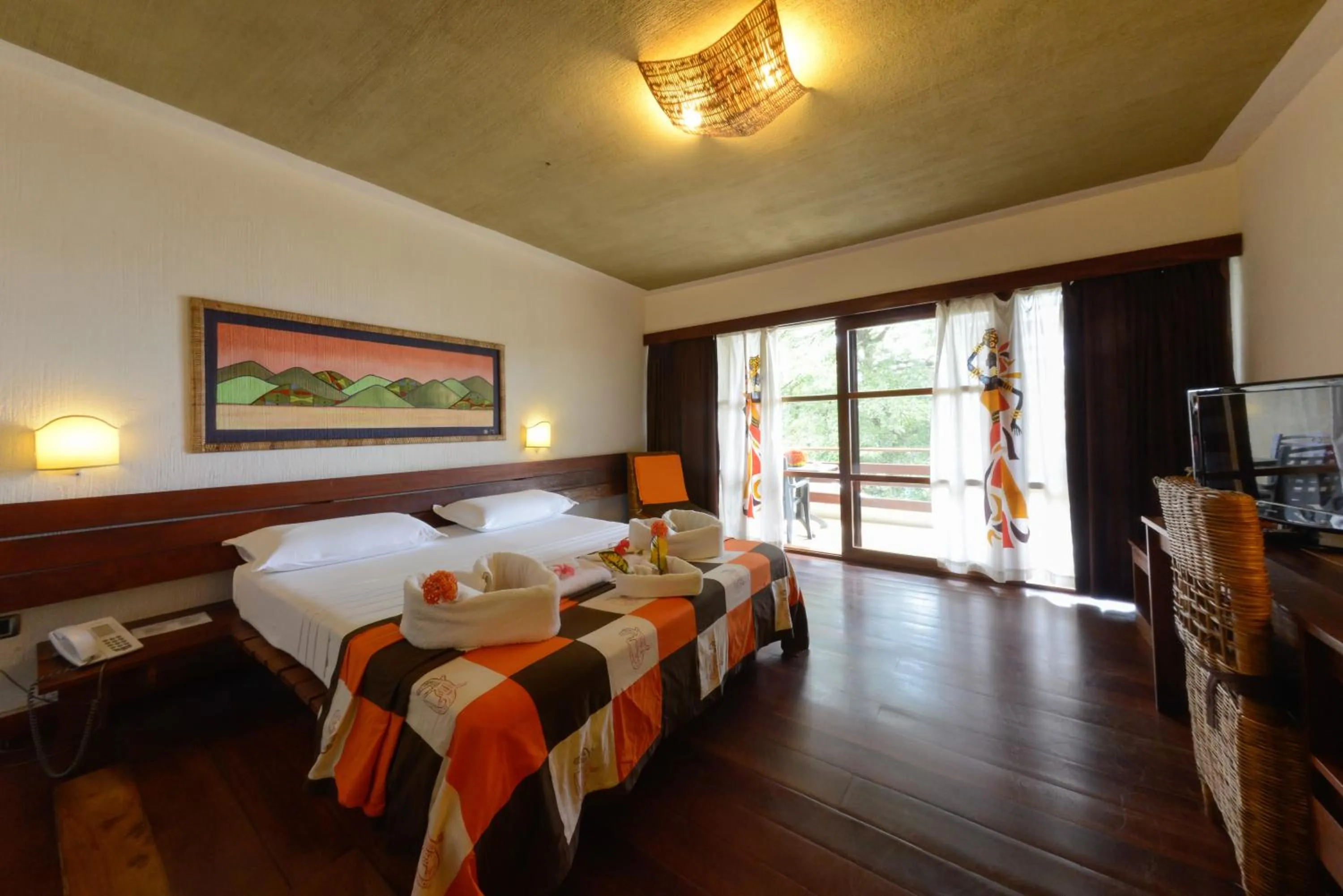 Photo of the whole room, Bed in Hotel Club du Lac Tanganyika