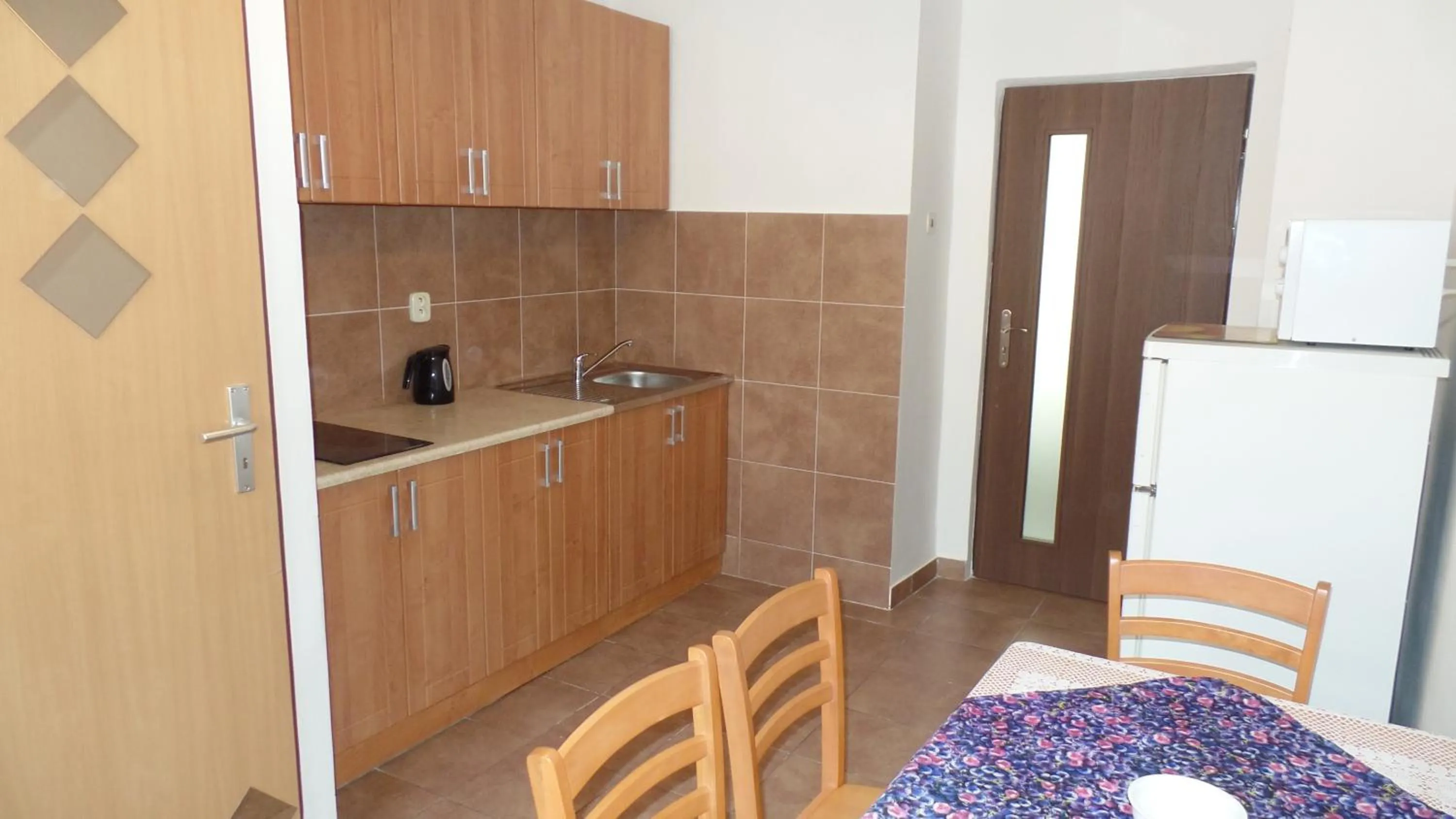 Kitchen or kitchenette in Apartments Rokytka - Praha