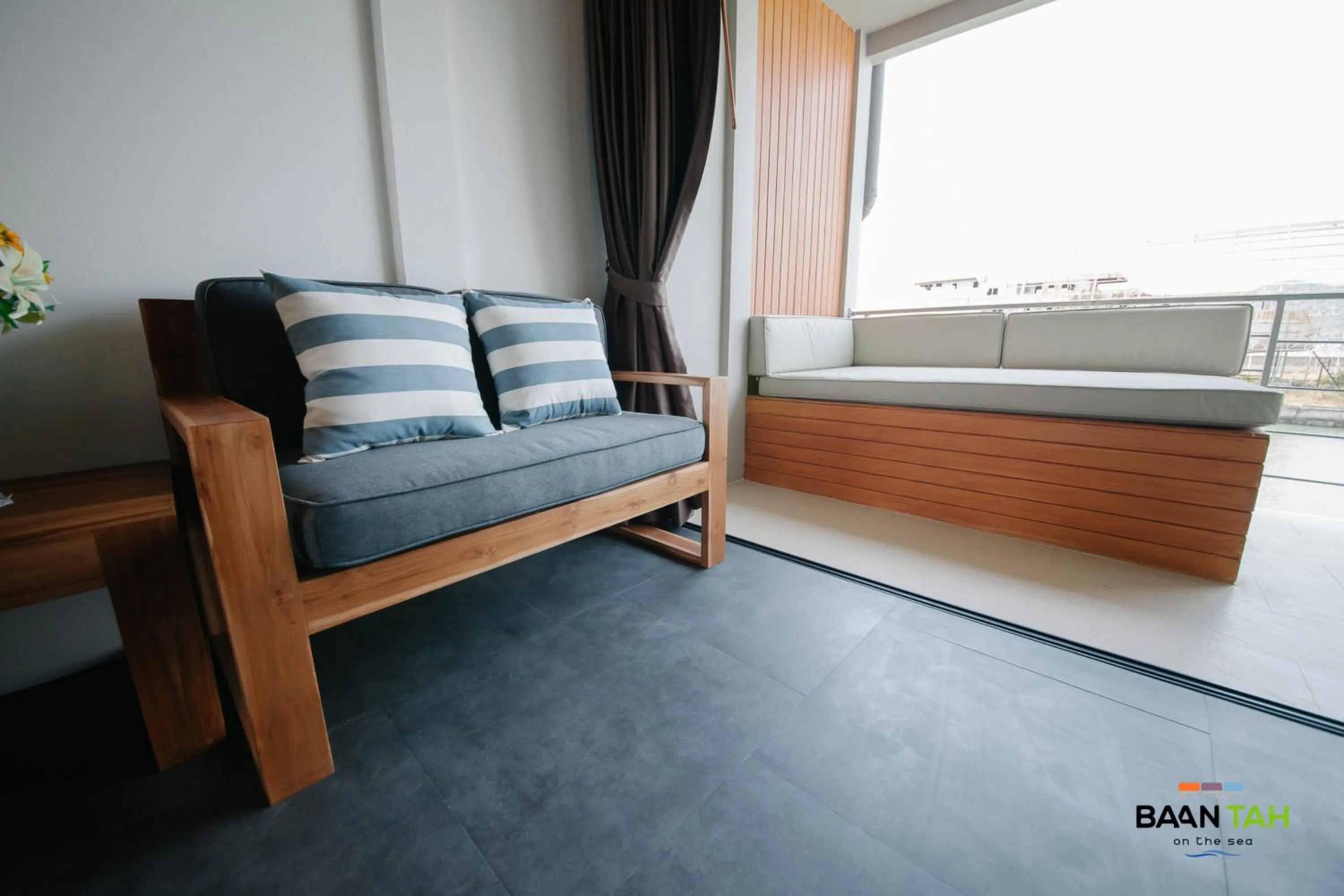 Seating area, Bed in Baan Tah On The Sea