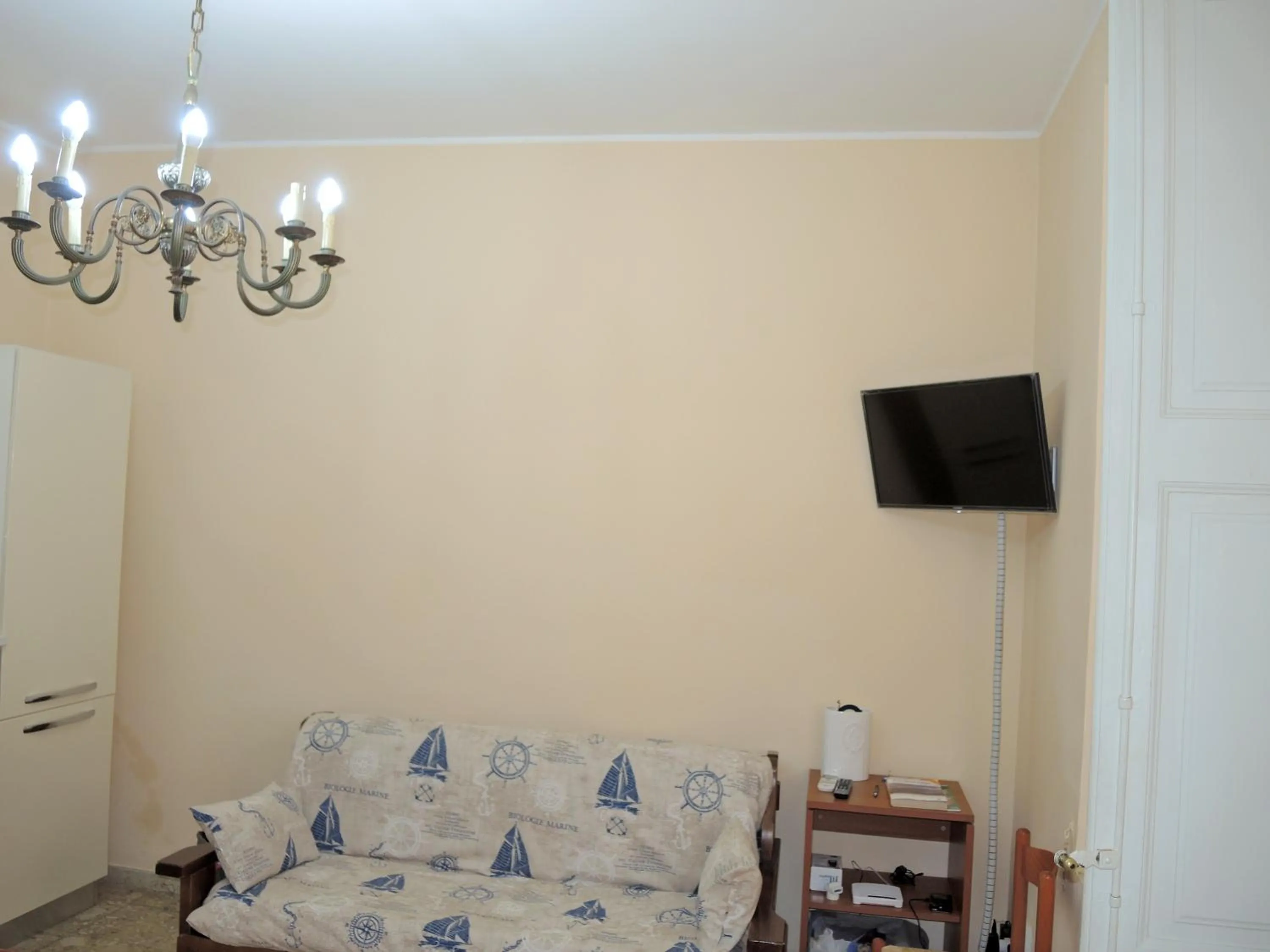 Communal lounge/ TV room in La Casa Di Ermelinda