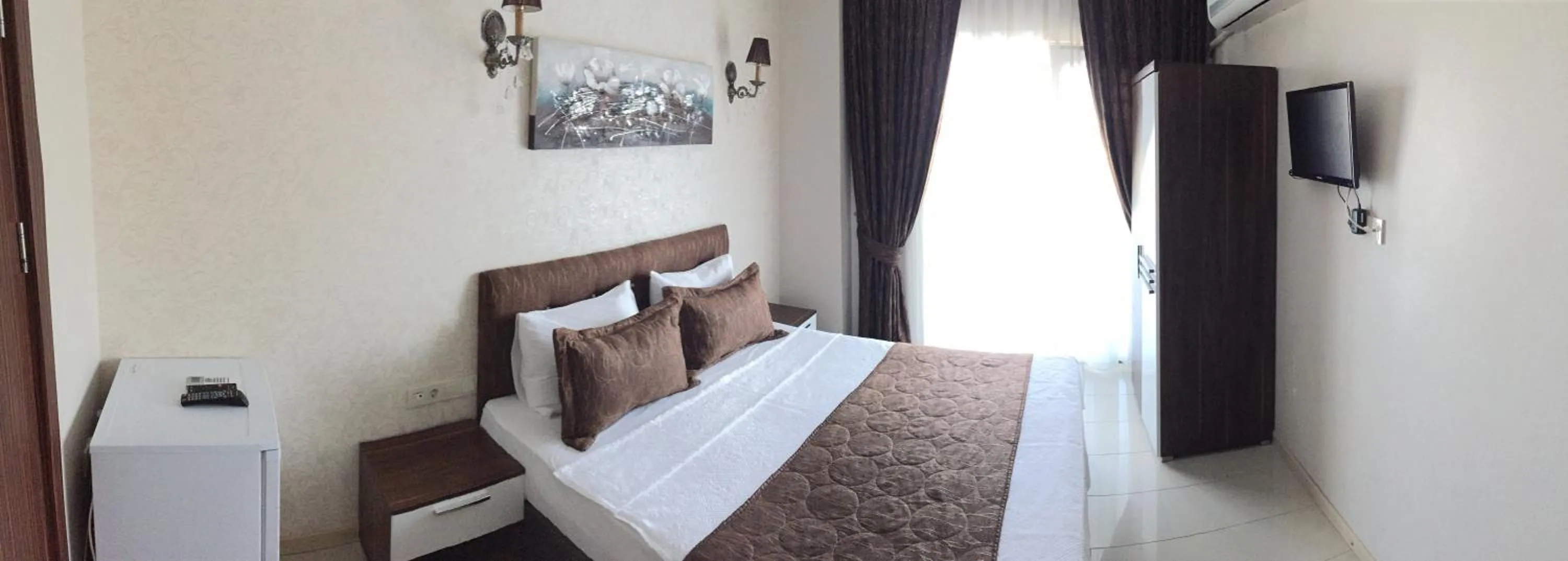 Bed in Geyi̇kli̇ Sunshi̇ne Hotel
