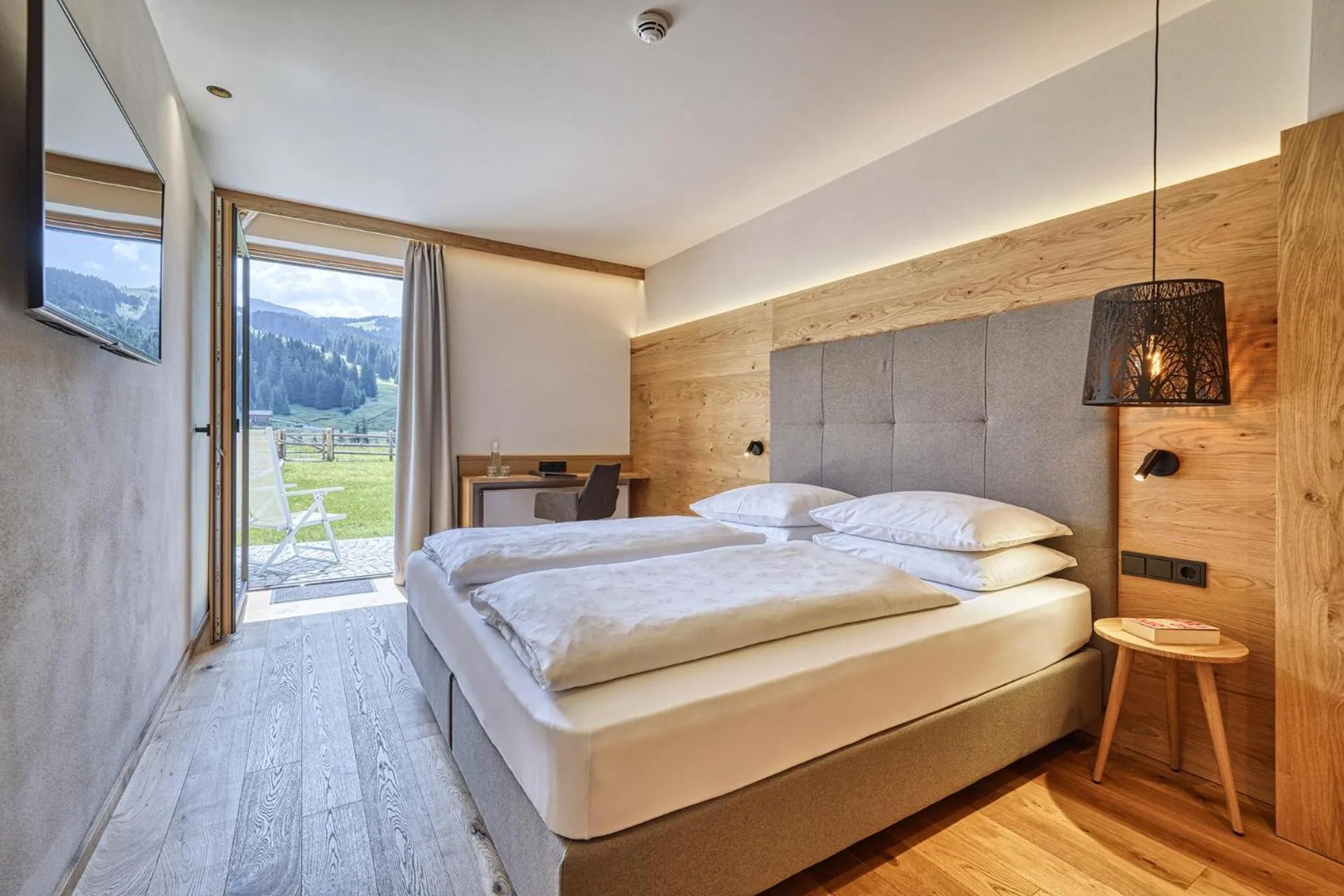 Bed in Brunelle Seiser Alm Lodge