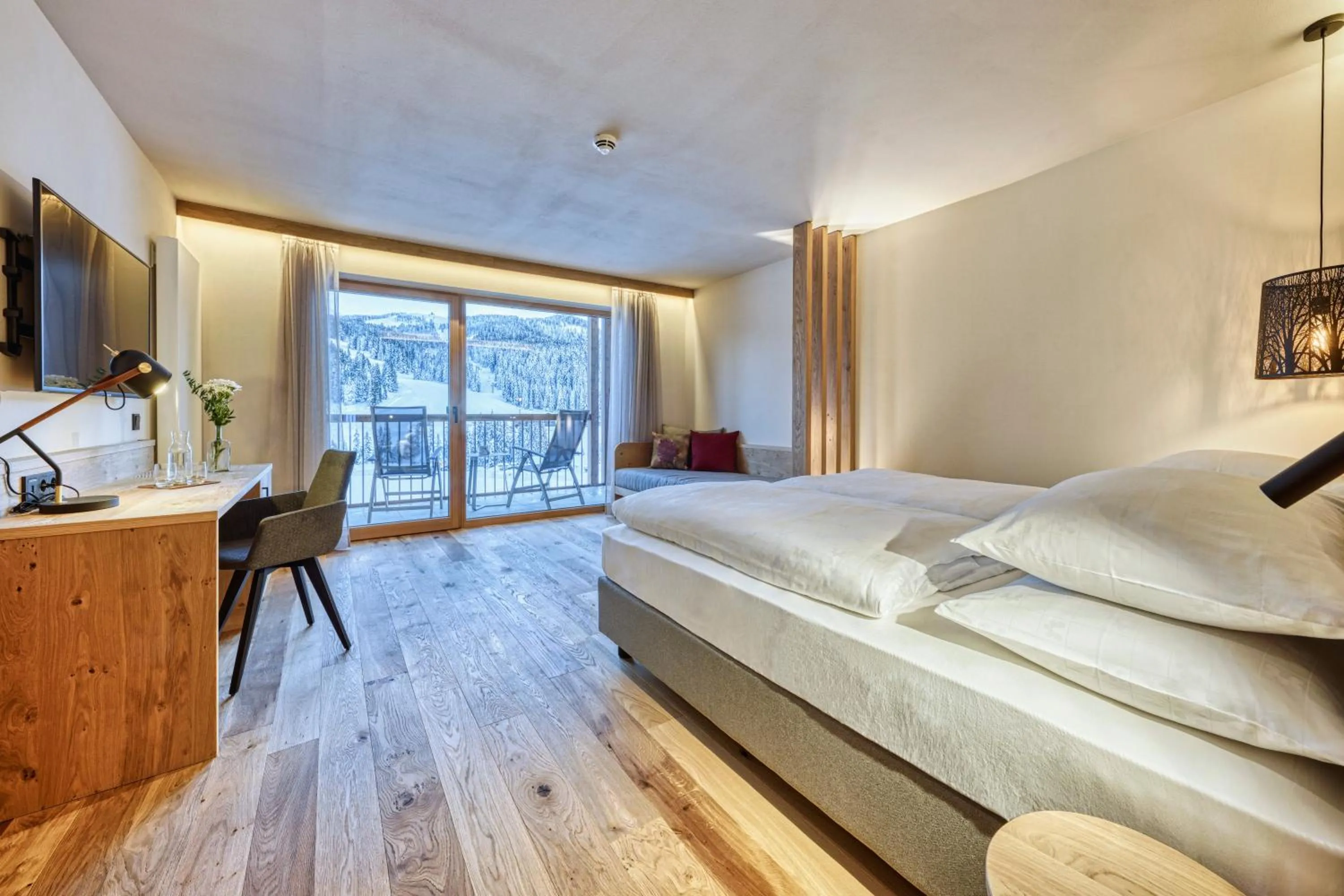 Photo of the whole room, Bed in Brunelle Seiser Alm Lodge