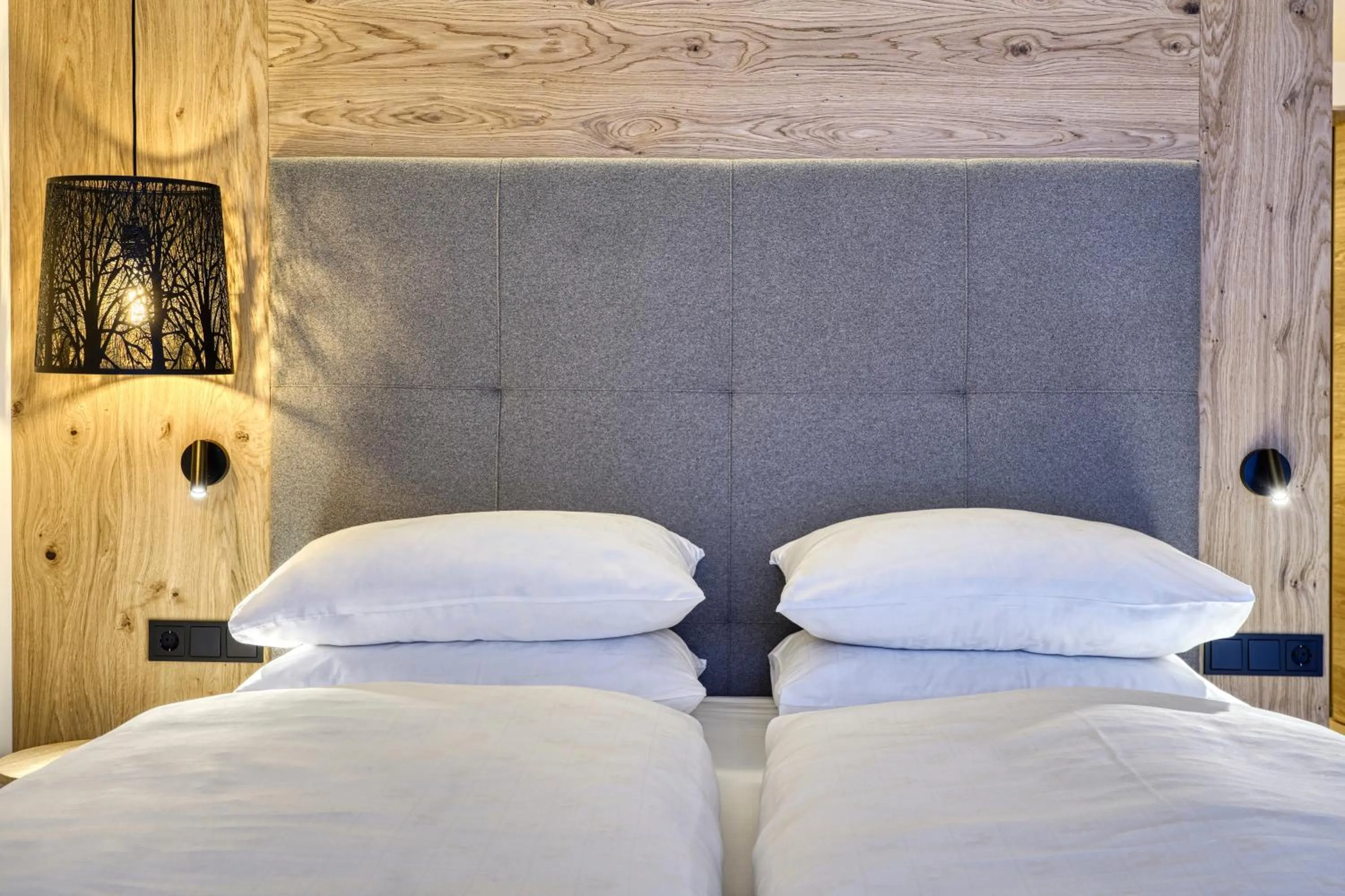 Bed in Brunelle Seiser Alm Lodge