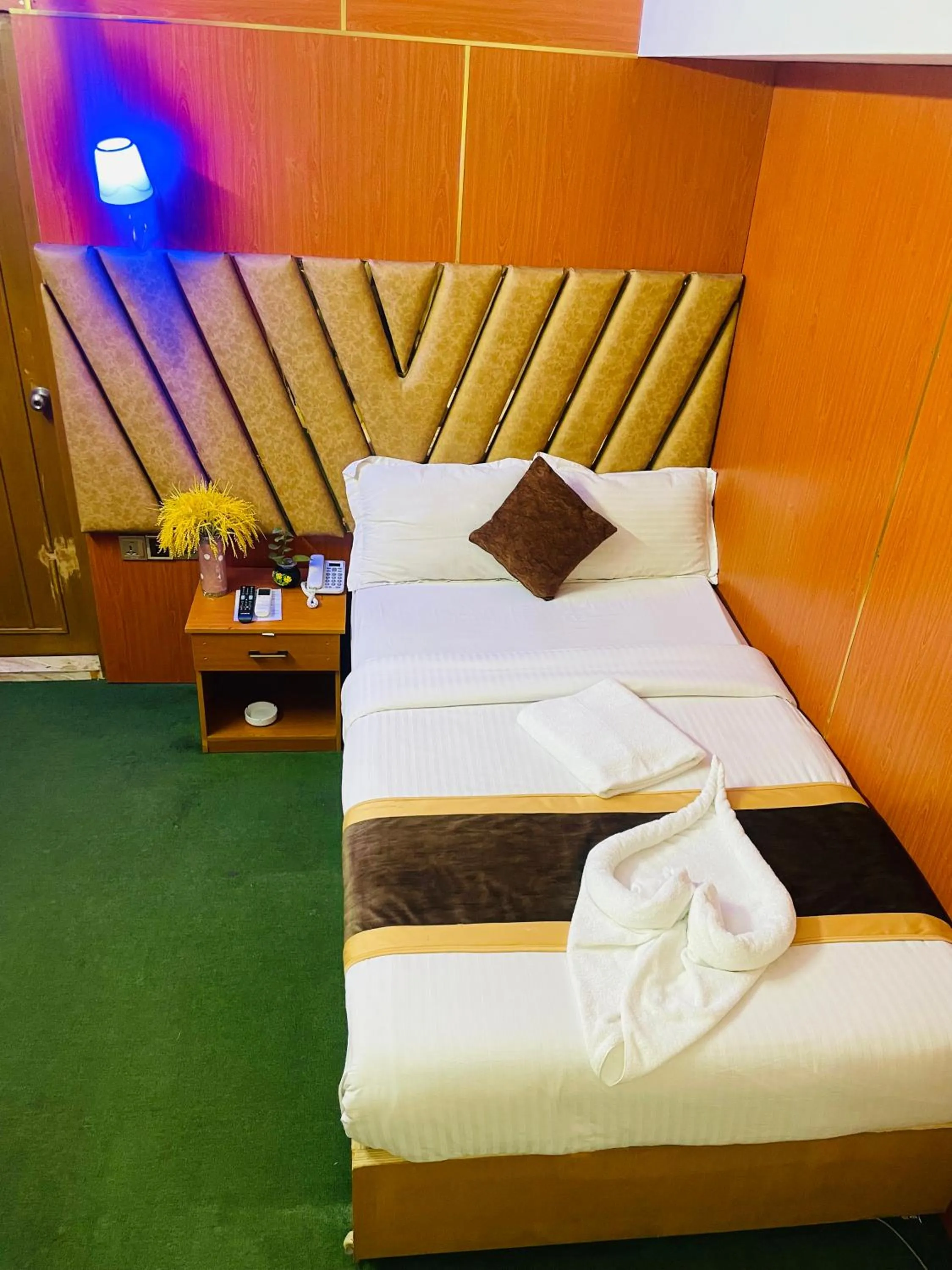 Bed in Hotel Rosewood Uttara