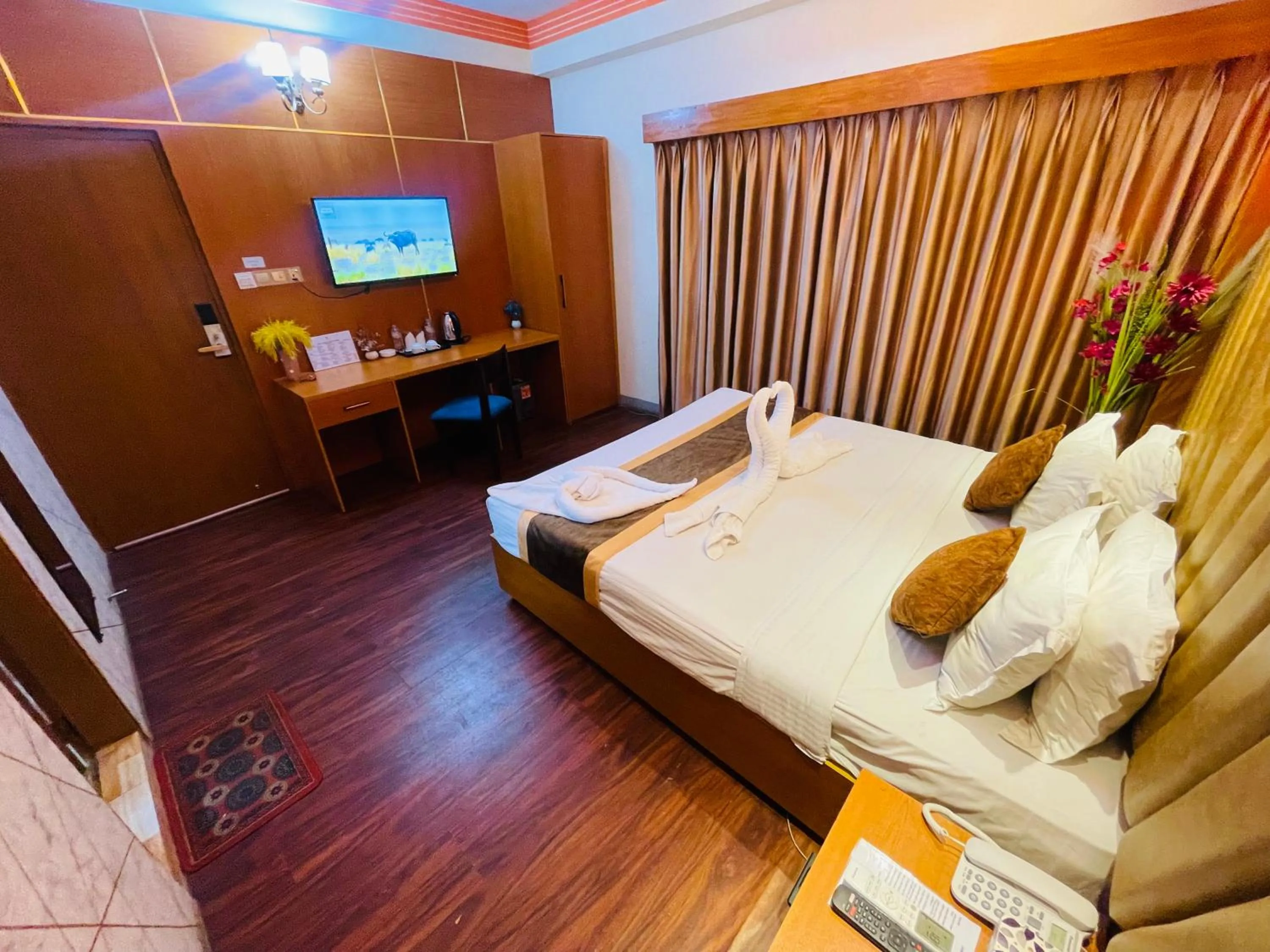 TV and multimedia, Bed in Hotel Rosewood Uttara