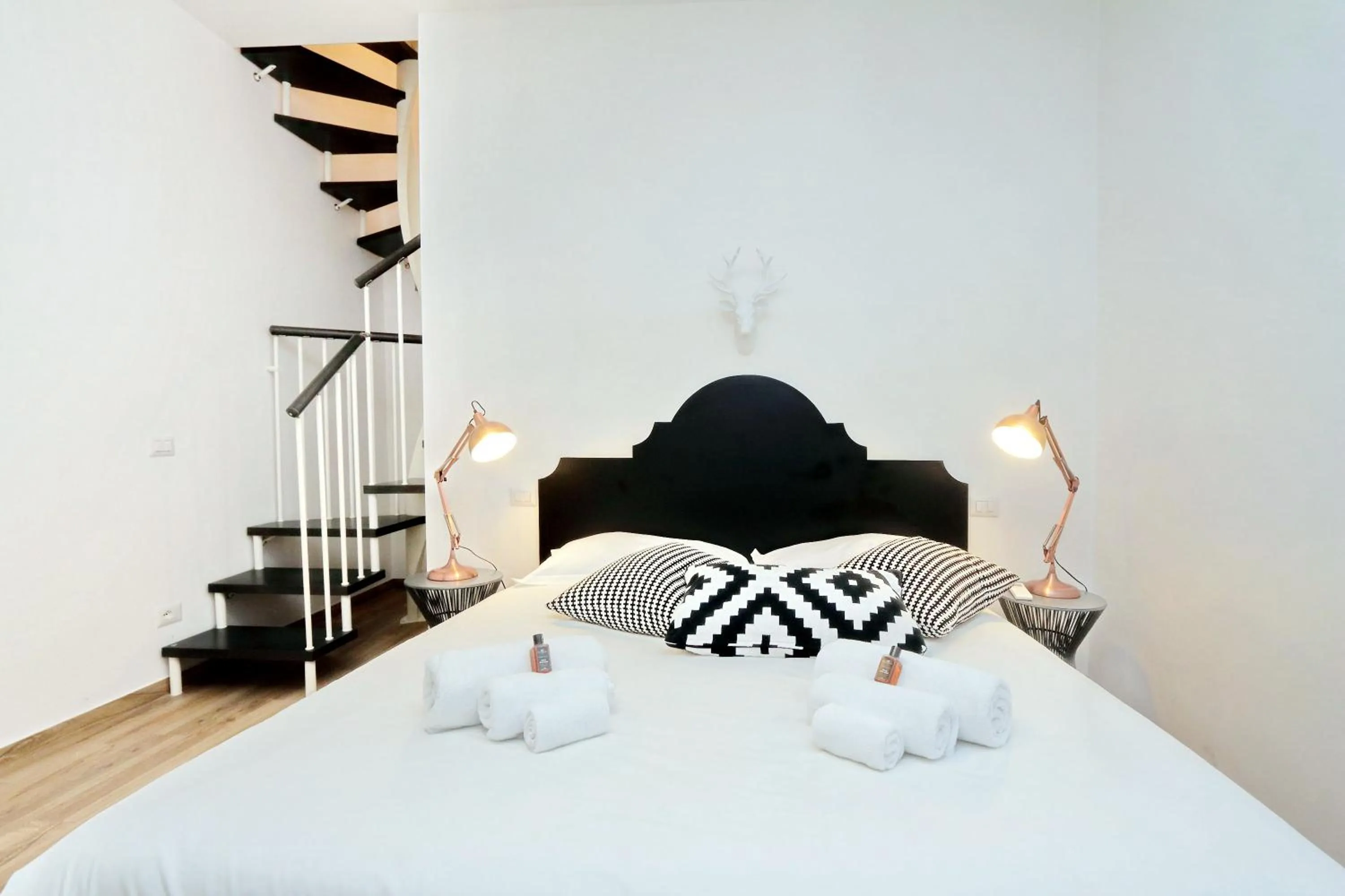 Bed in Monti Apartments - My Extra Home