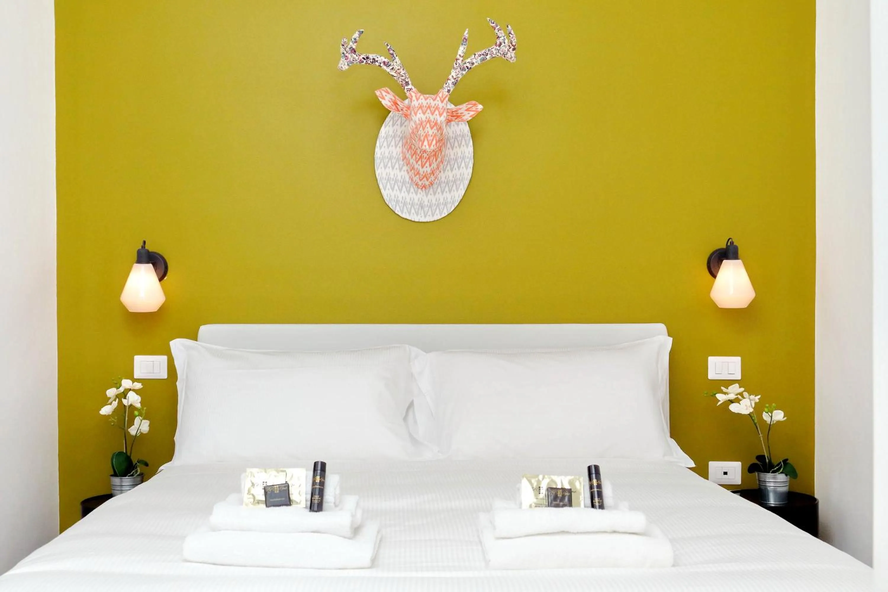 Bed in Monti Apartments - My Extra Home