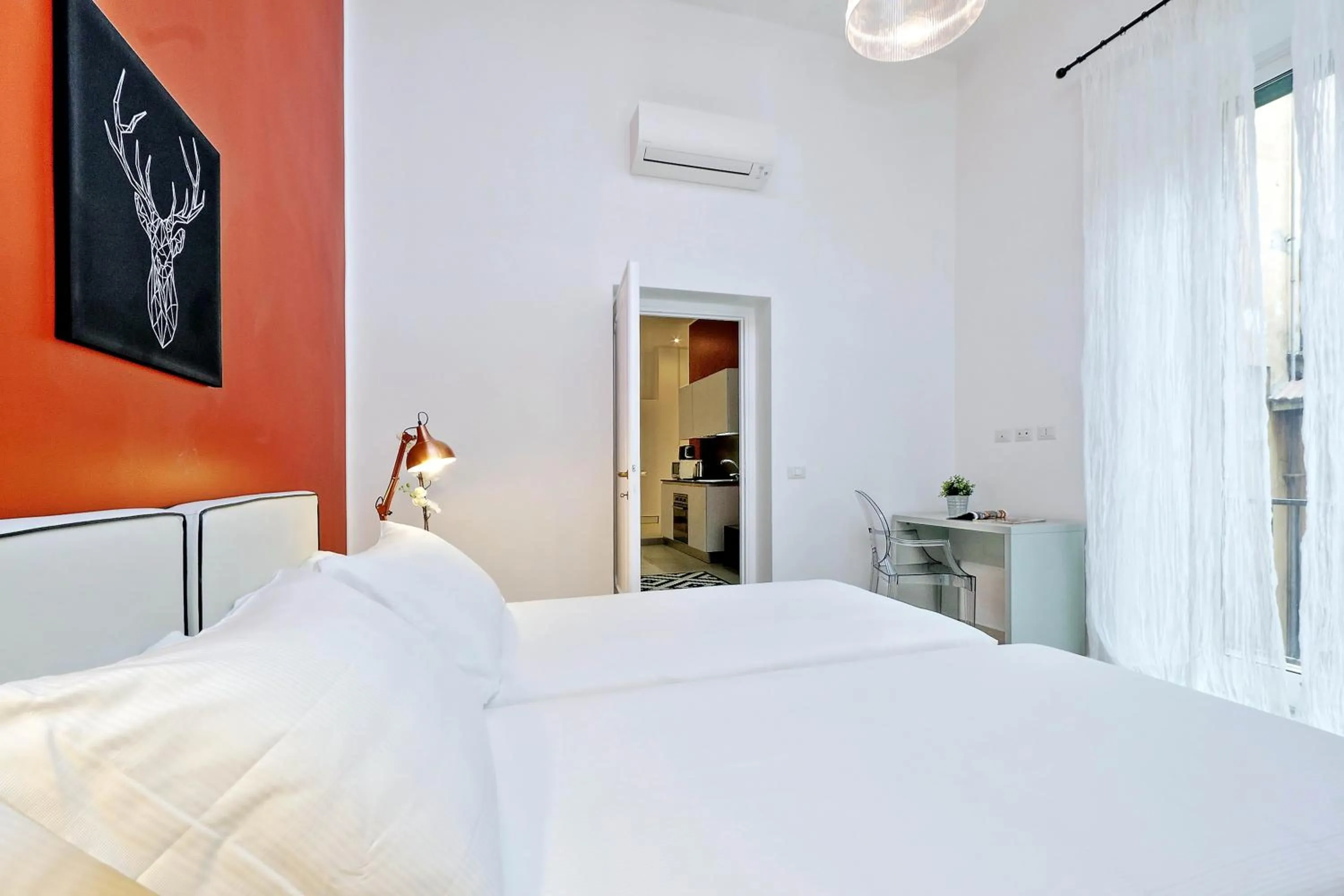 Bed in Monti Apartments - My Extra Home