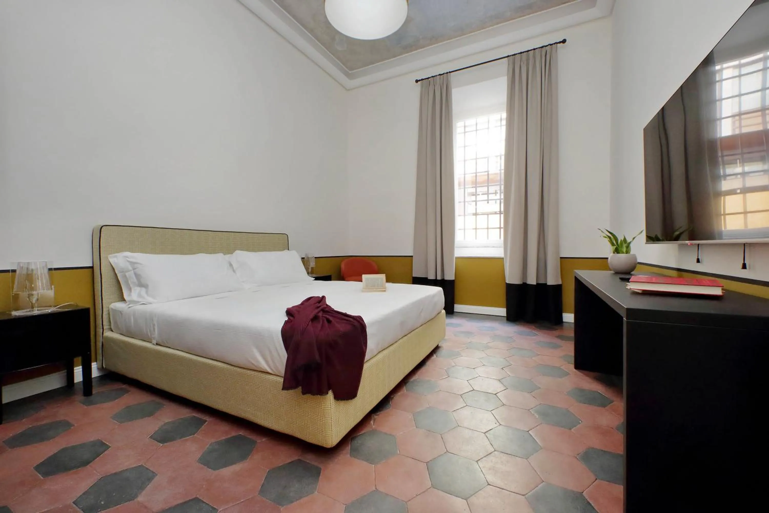 Bed in Monti Apartments - My Extra Home