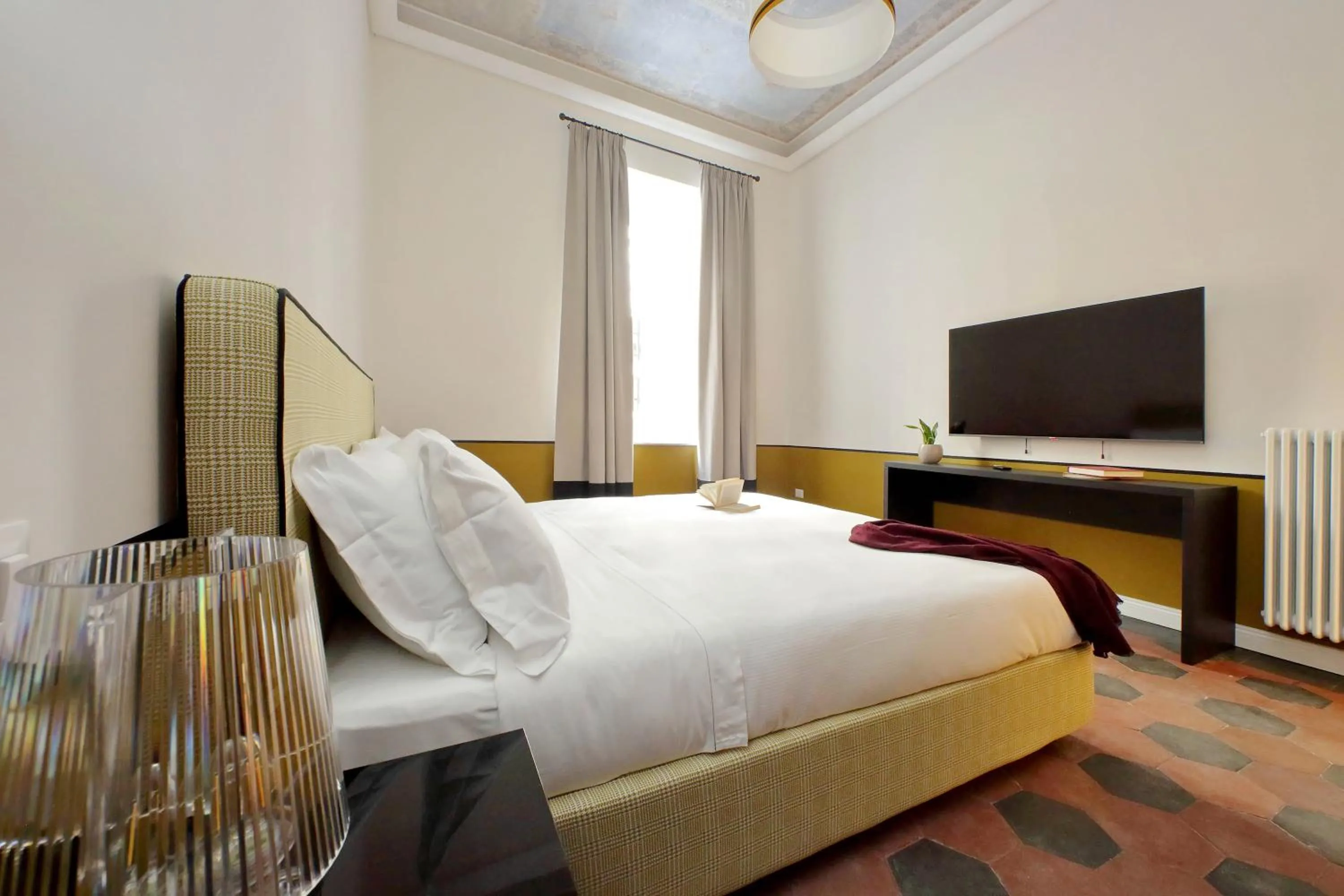 Bed in Monti Apartments - My Extra Home