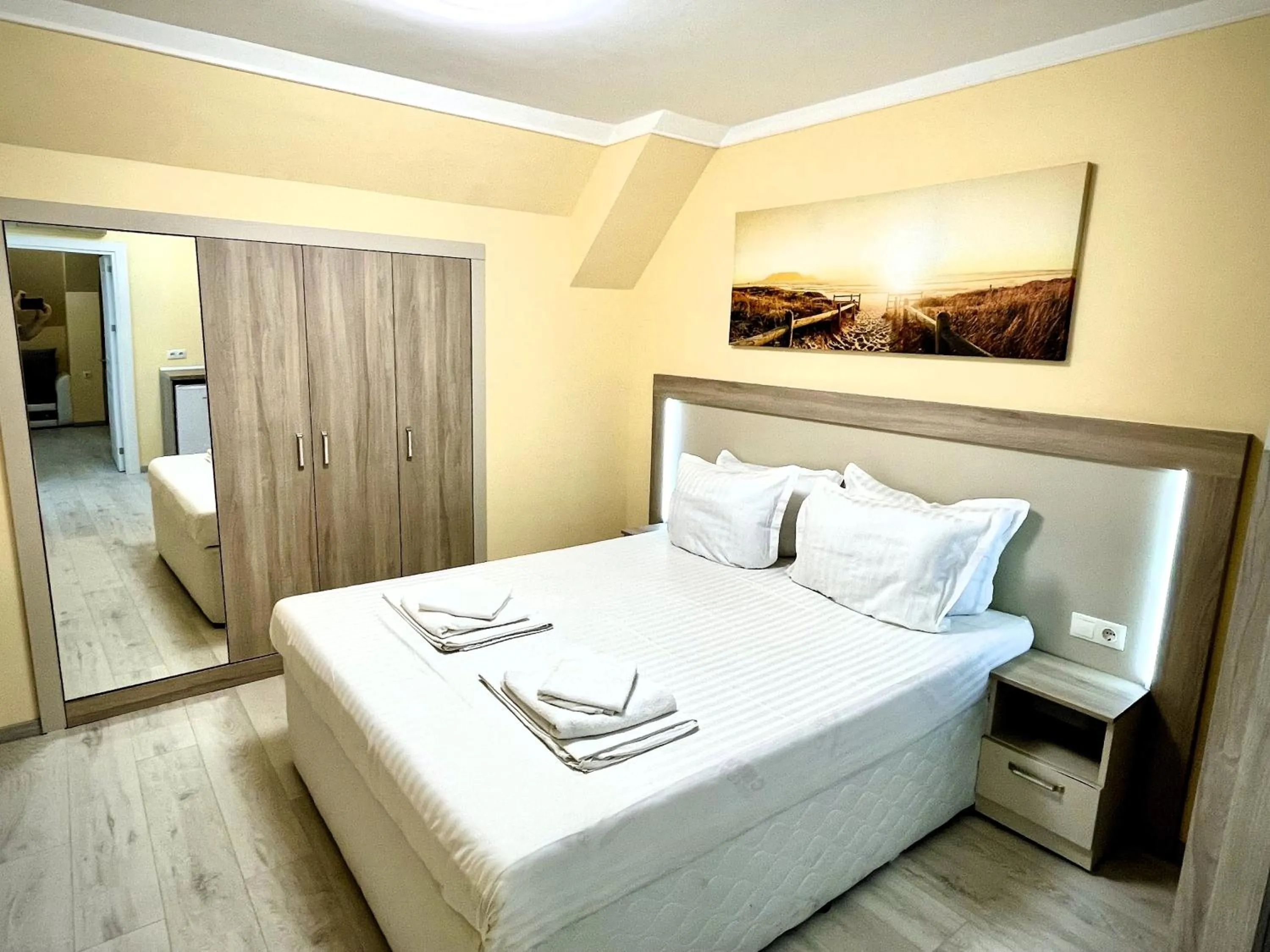 Bed in APART-HOTEL Stamopolu Lux с изглед към морето