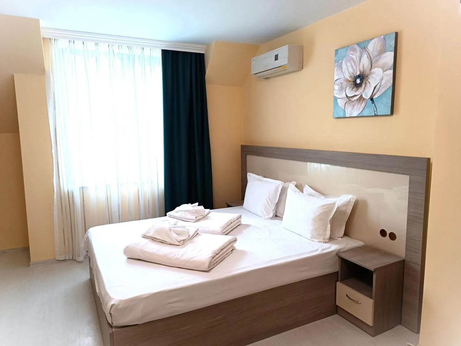 Bed in APART-HOTEL Stamopolu Lux с изглед към морето