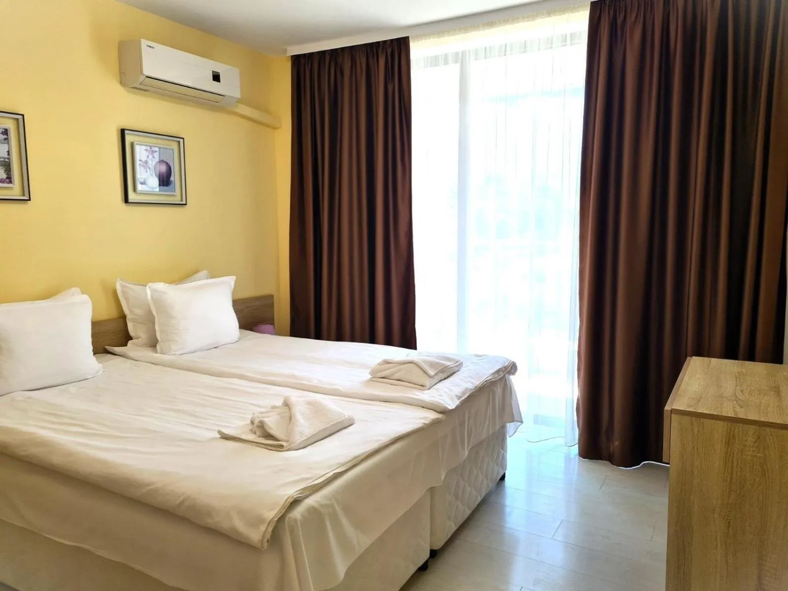 Bed in APART-HOTEL Stamopolu Lux с изглед към морето