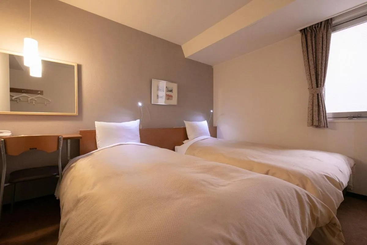 Bed in Morioka City Hotel