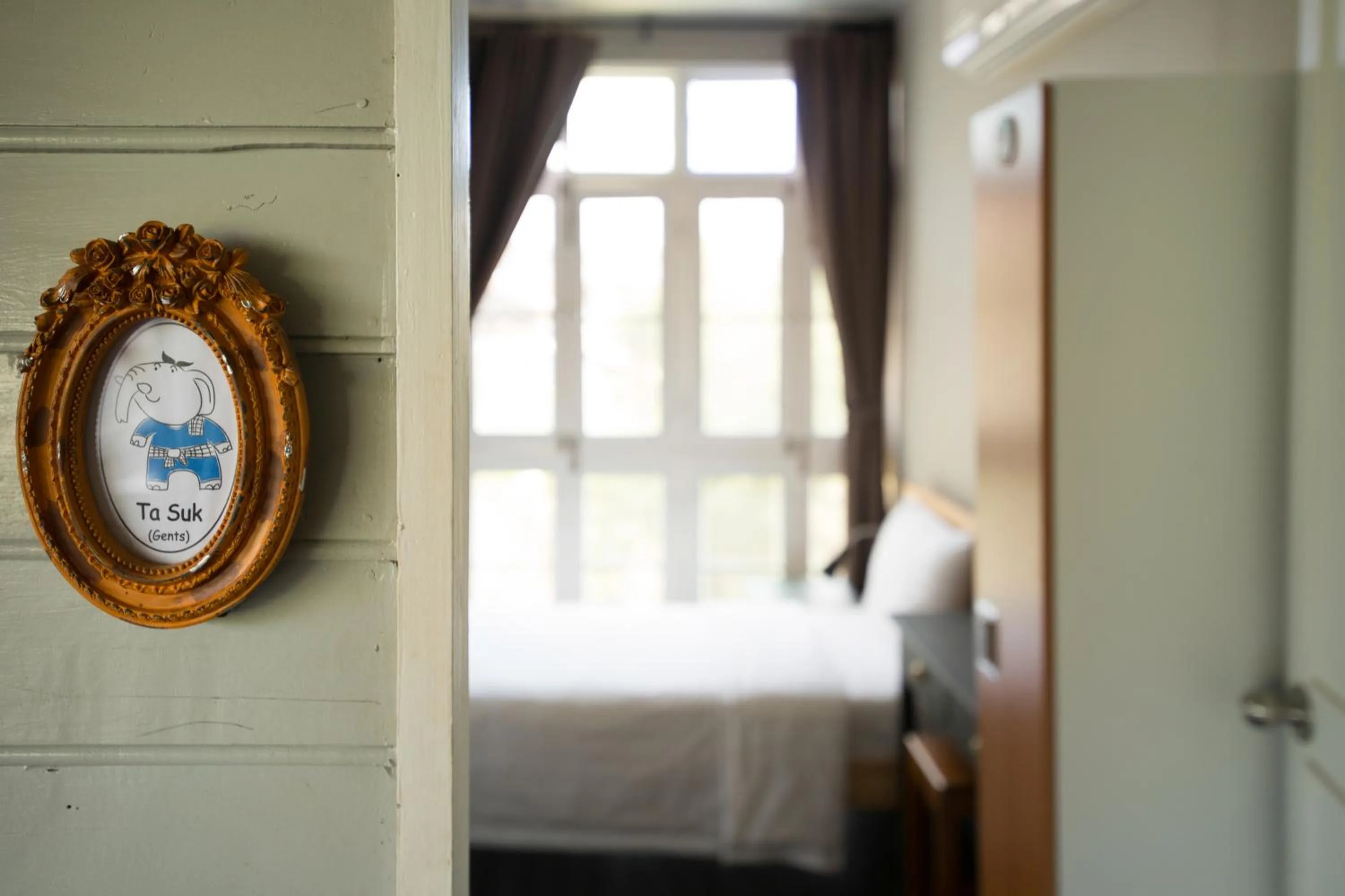 Decorative detail, Bed in Dorm of Happiness by Tharaburi Resort
