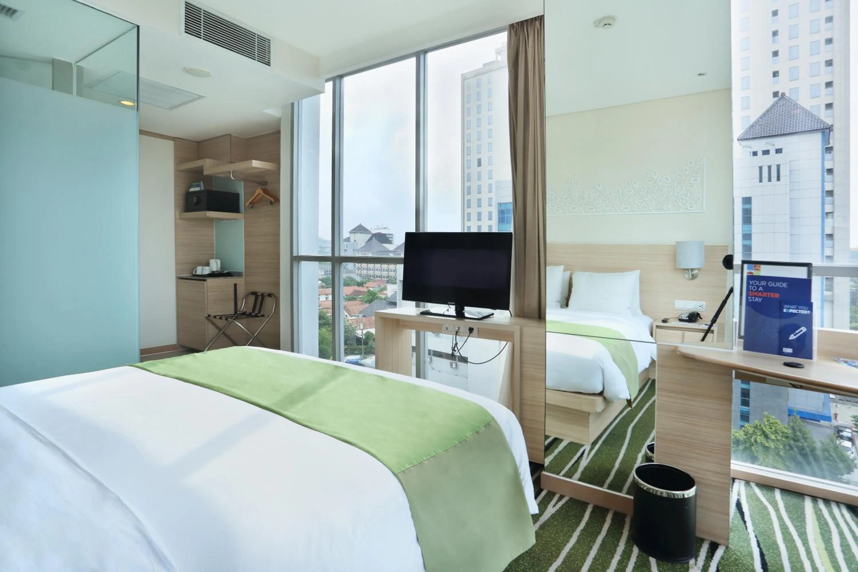 Bed in Holiday Inn Express Semarang Simpang Lima by IHG