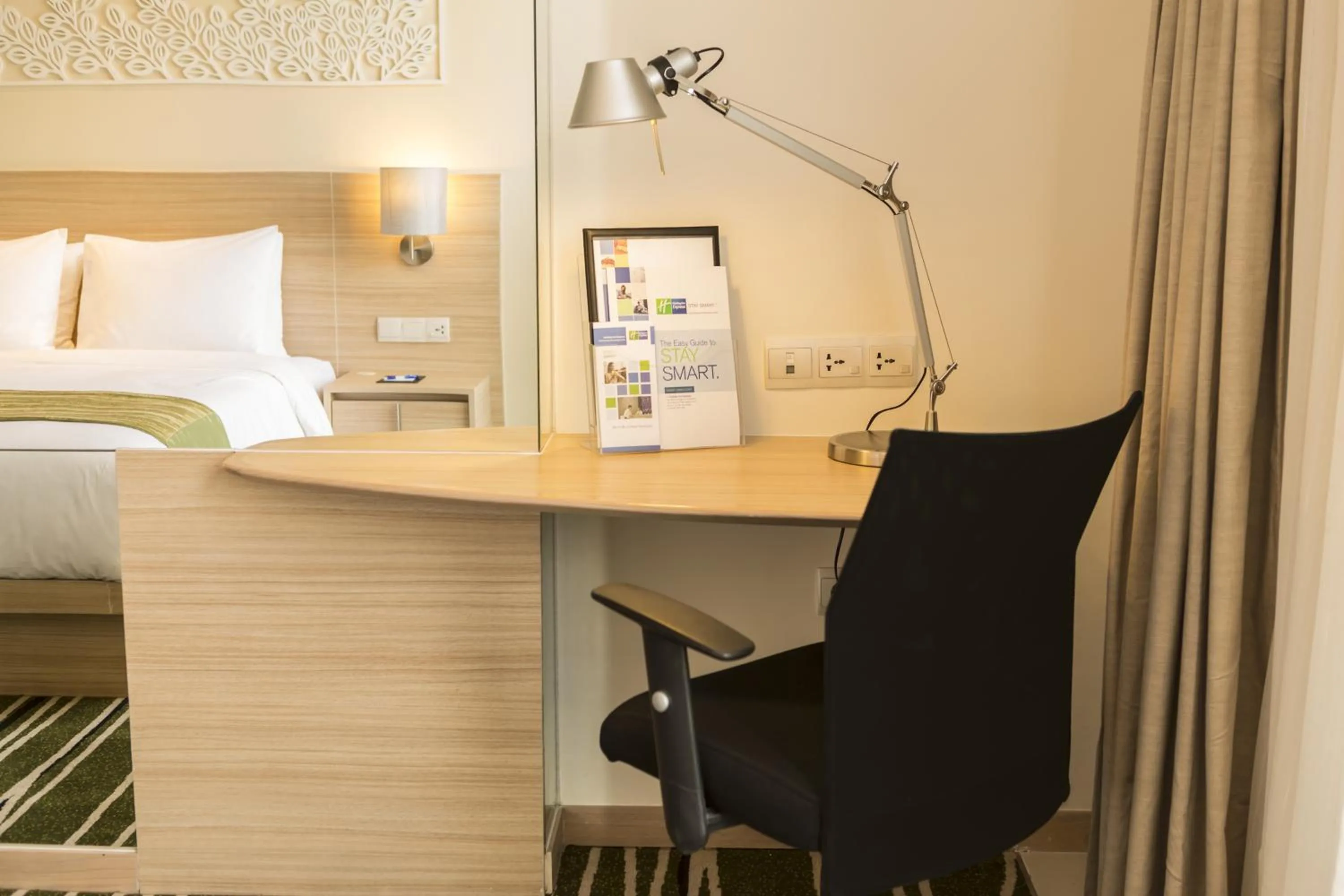 Seating area, Bed in Holiday Inn Express Semarang Simpang Lima by IHG