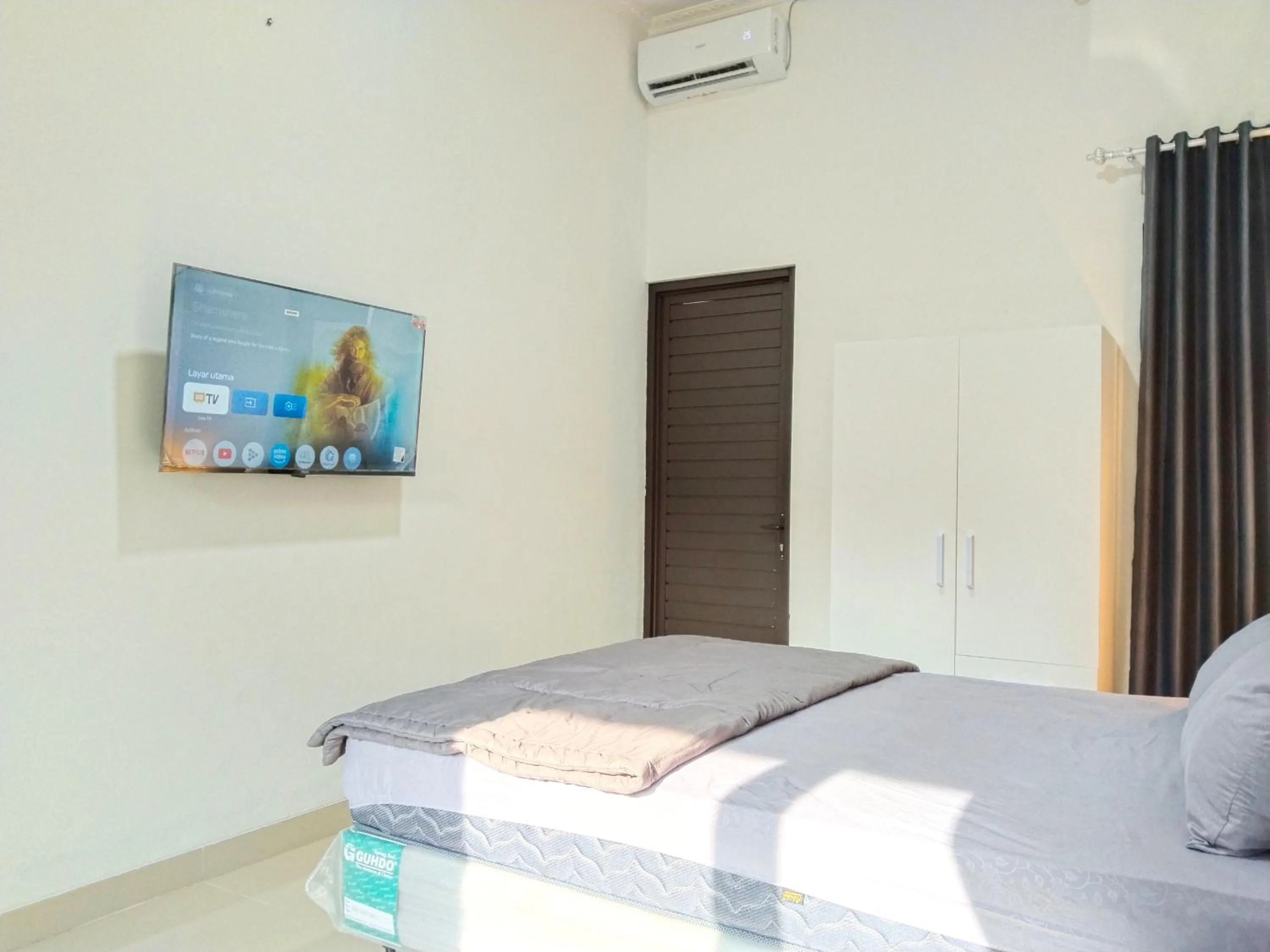 Bed in Roemah Kavaleri powered by Cocotel