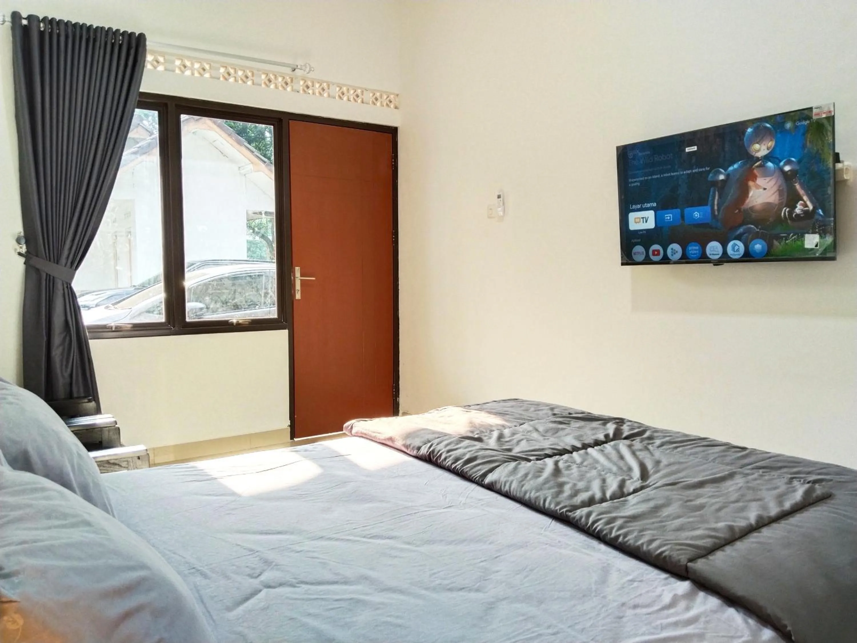 Bed in Roemah Kavaleri powered by Cocotel