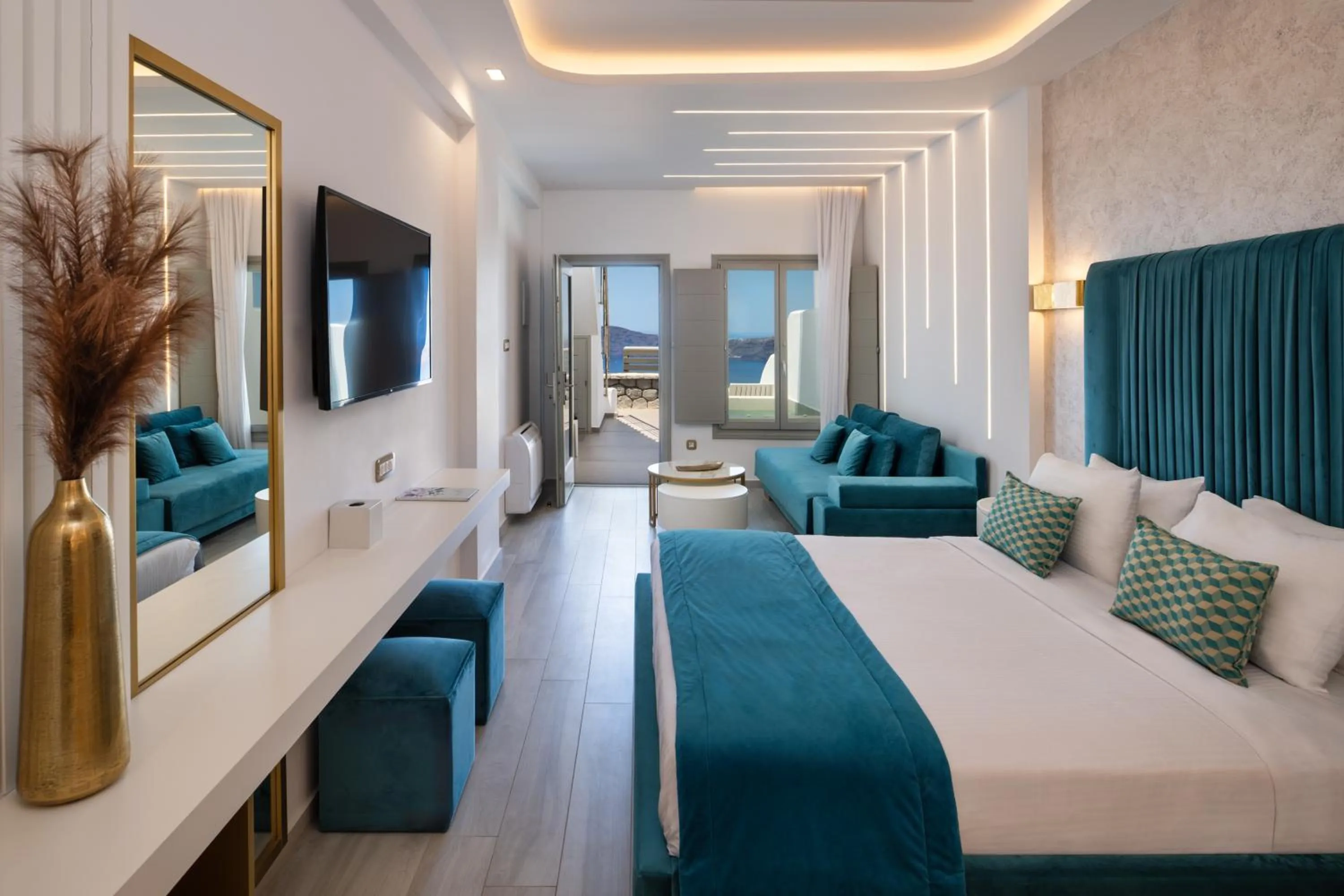 Photo of the whole room, Bed in Aura Suites