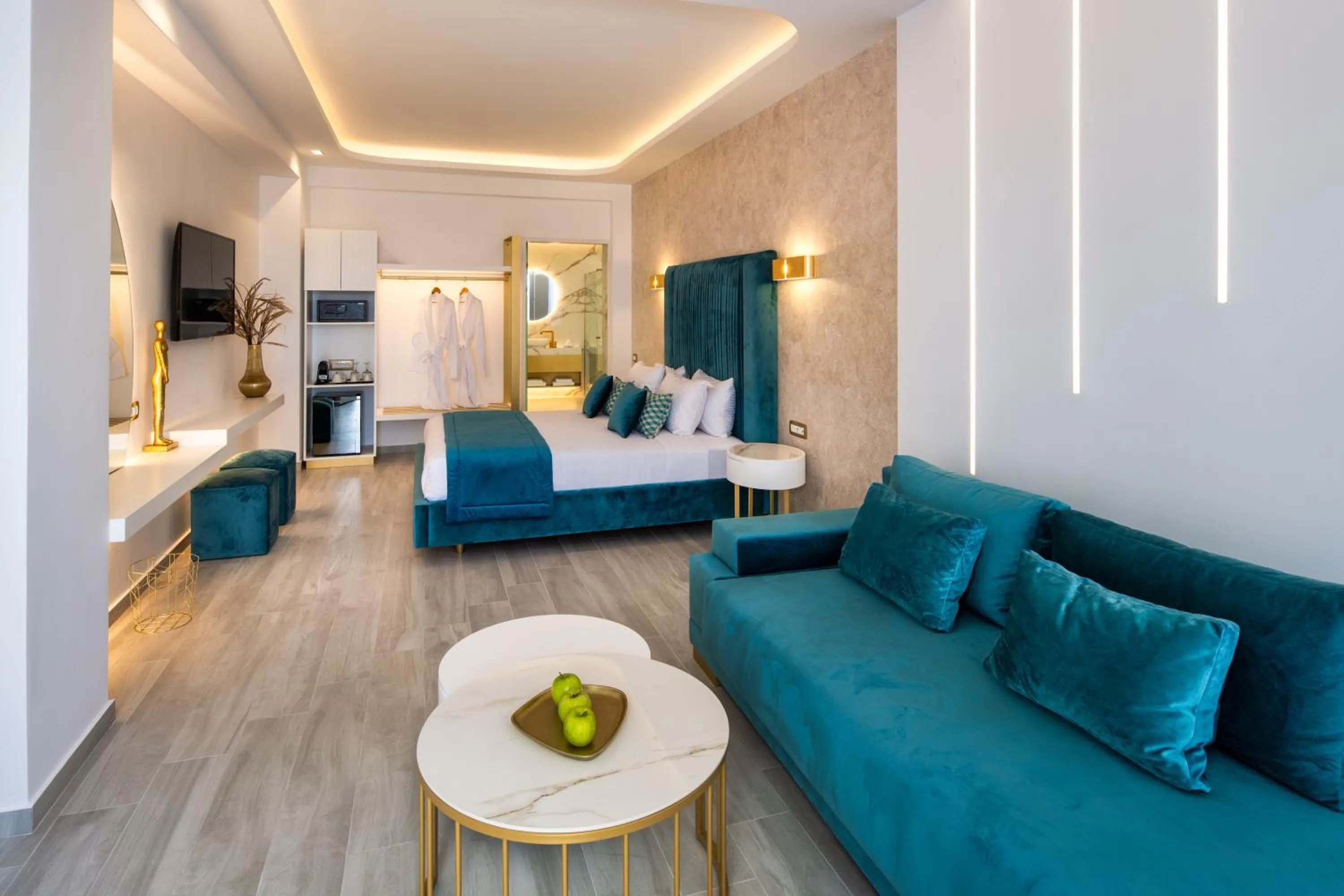 Seating area, Bed in Aura Suites