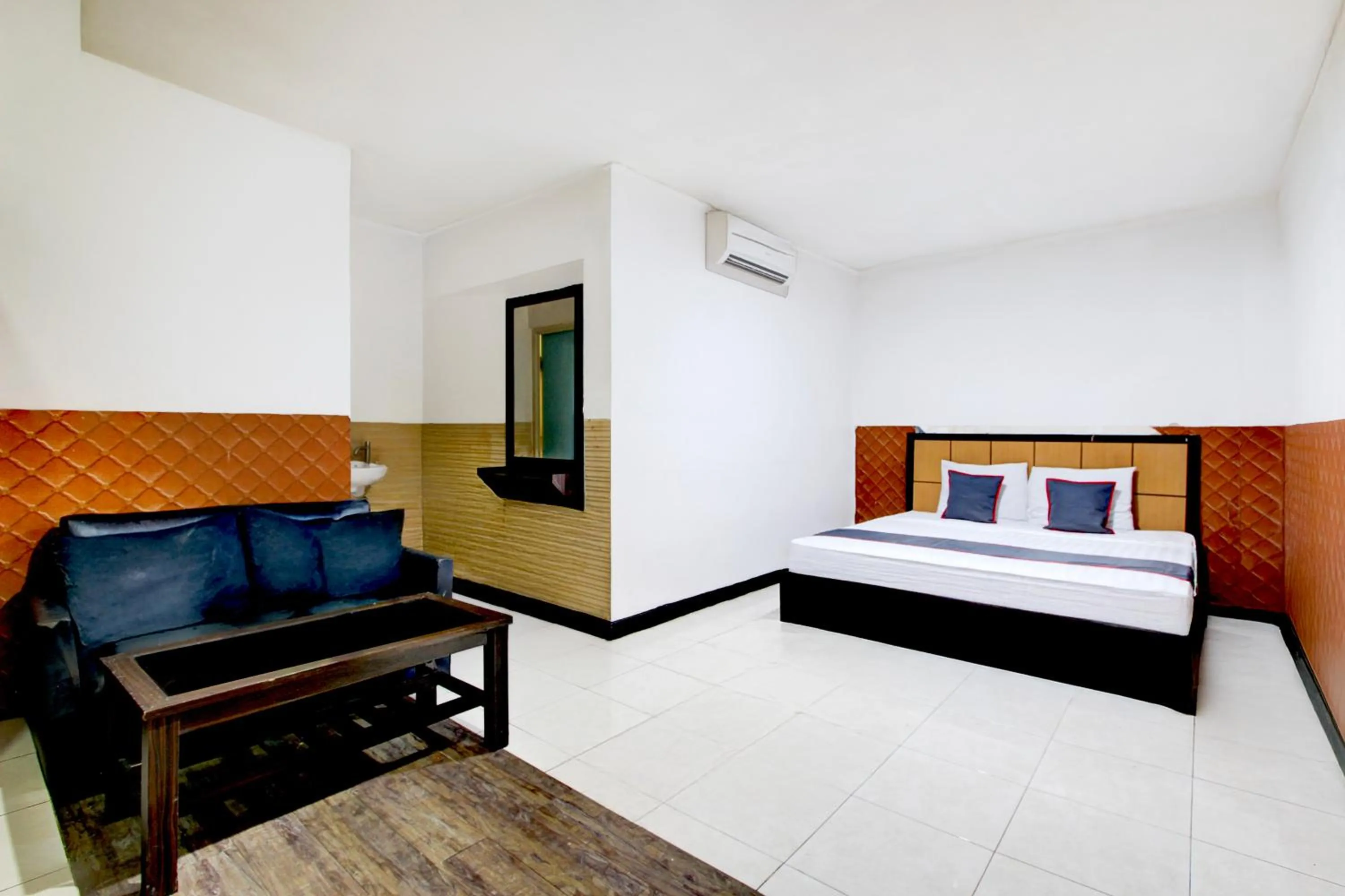 Bed in Hotel O Mega Inn Guest House