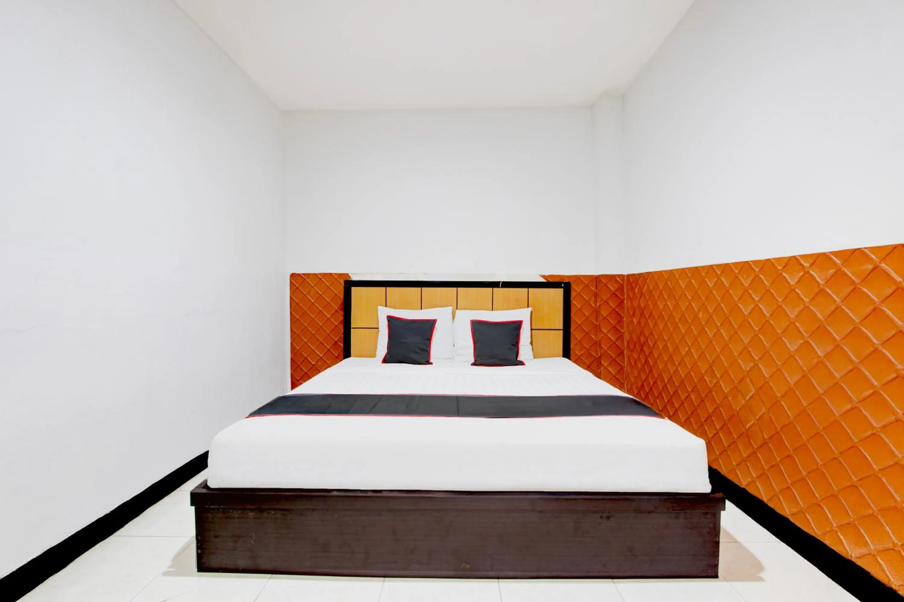 Bed in Hotel O Mega Inn Guest House