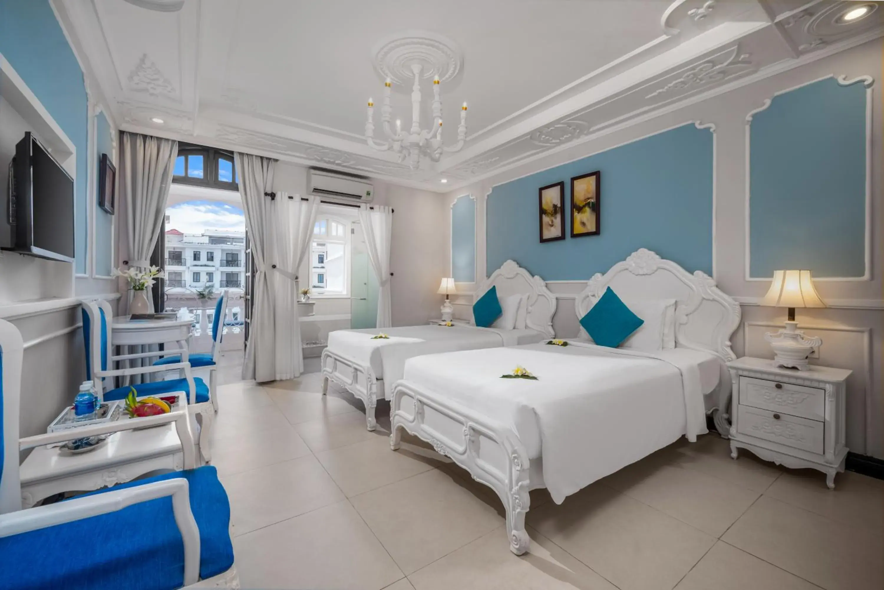Junior Deluxe Double or Twin Room with Balcony in Hoi An Garden Palace and Spa - A Boutique Inspired by Nature Junior Deluxe Double or Twin Room with Balcony in Hoi An Garden Palace and Spa - A Boutique Inspired by Nature